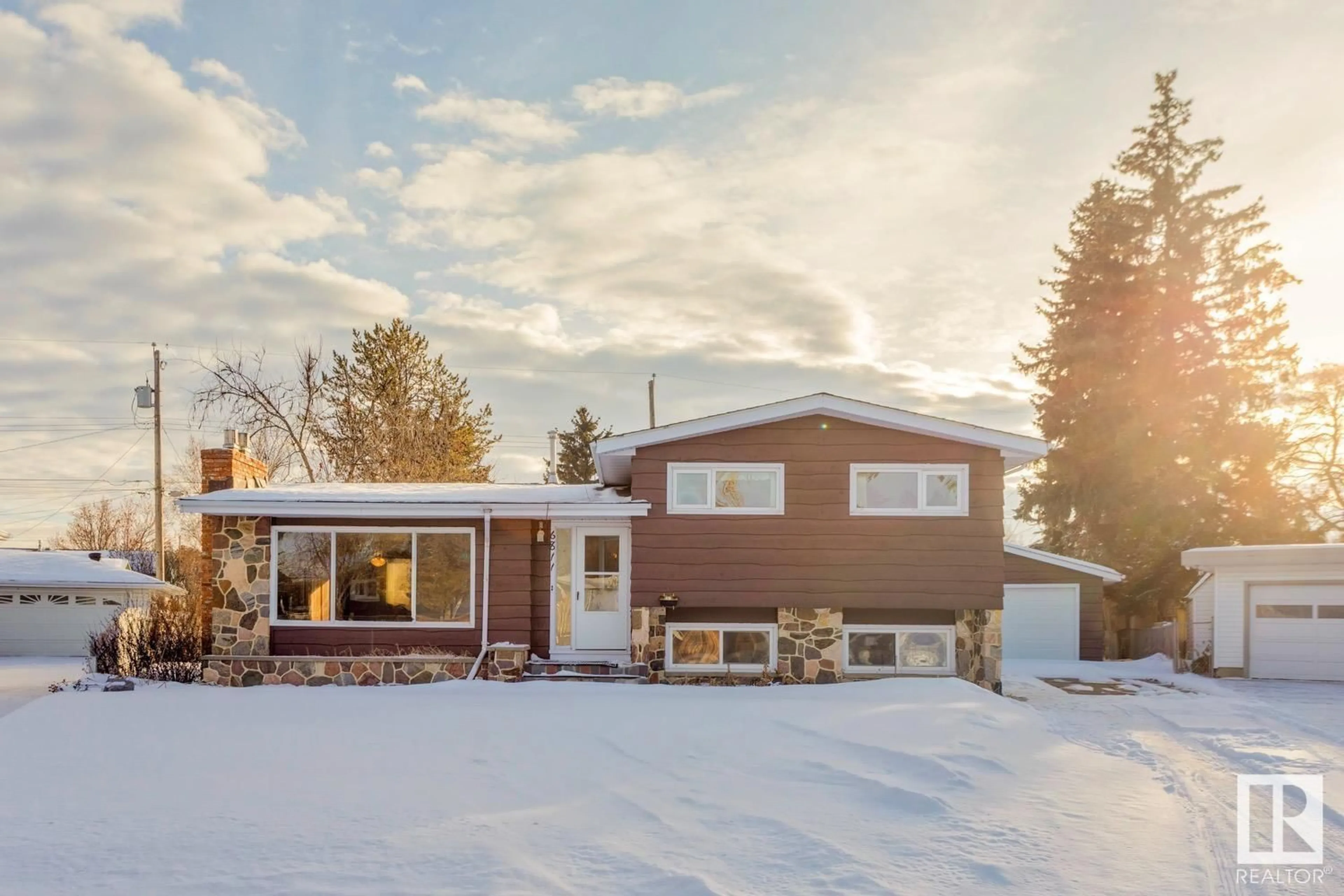 Home with vinyl exterior material, street for 6811 96A AV NW, Edmonton Alberta T6B1B4