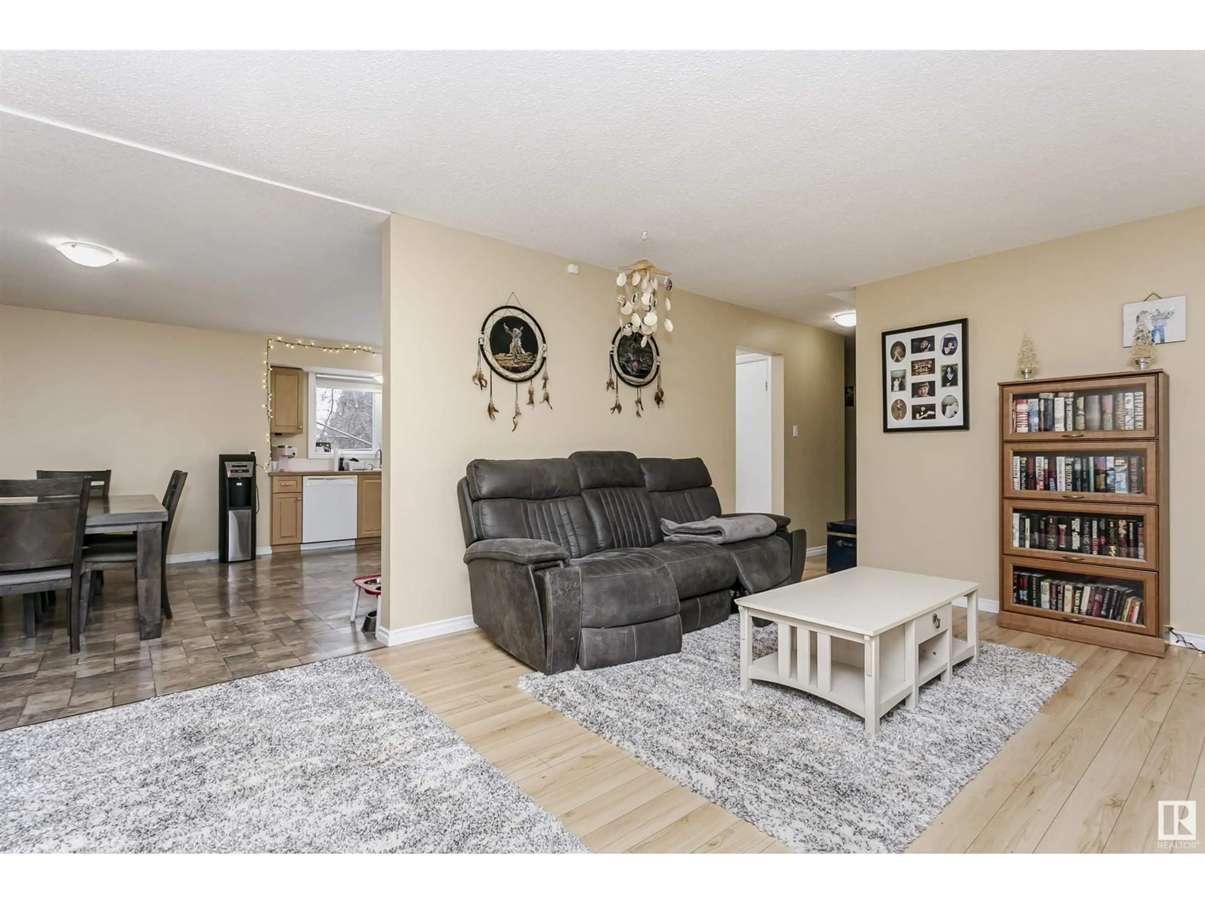 Living room with furniture, wood/laminate floor for 13 FALSTAFF AV, St. Albert Alberta T8N1V6