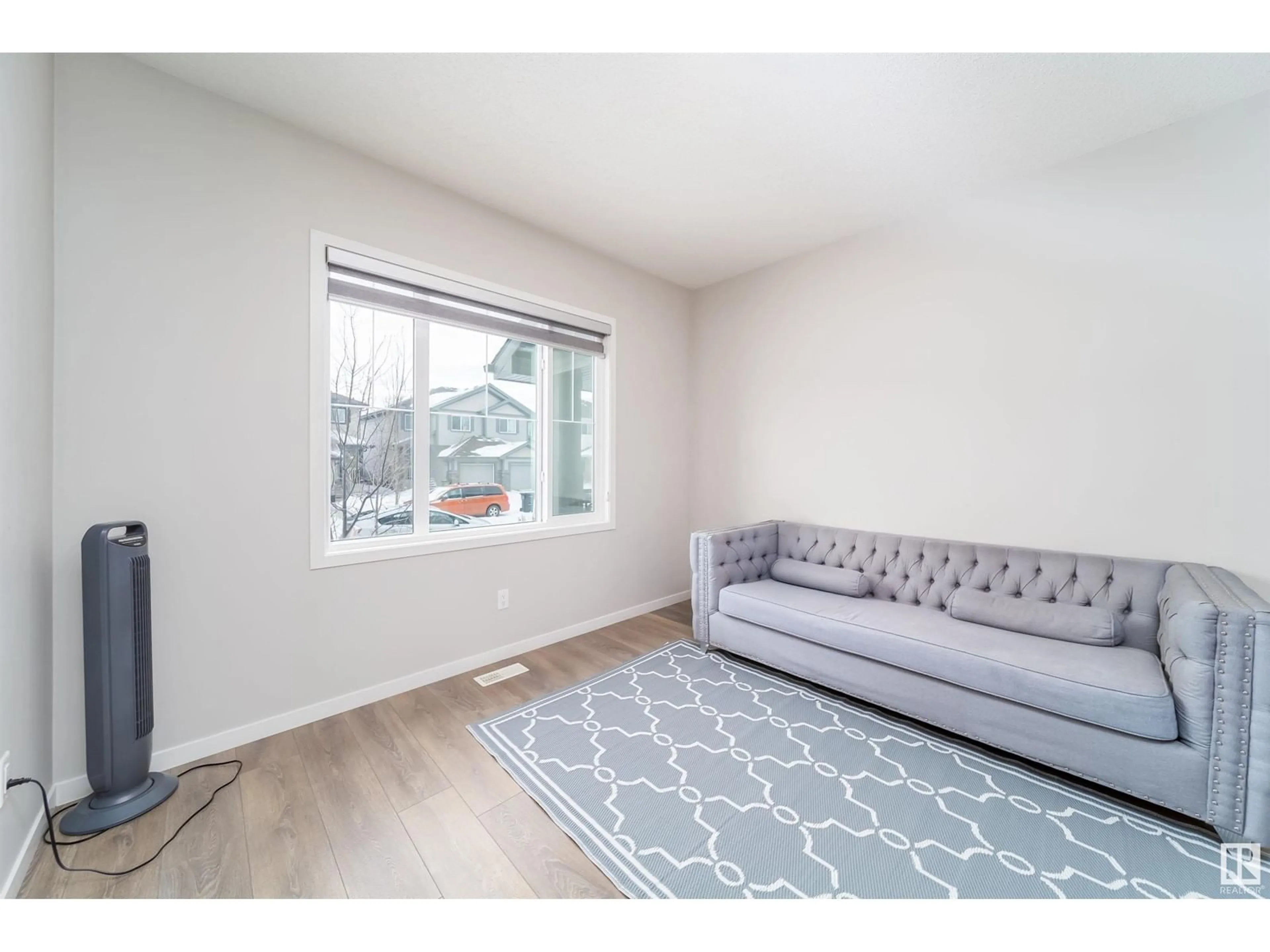 Living room with furniture, unknown for 1508 26 AV NW, Edmonton Alberta T6T0W2