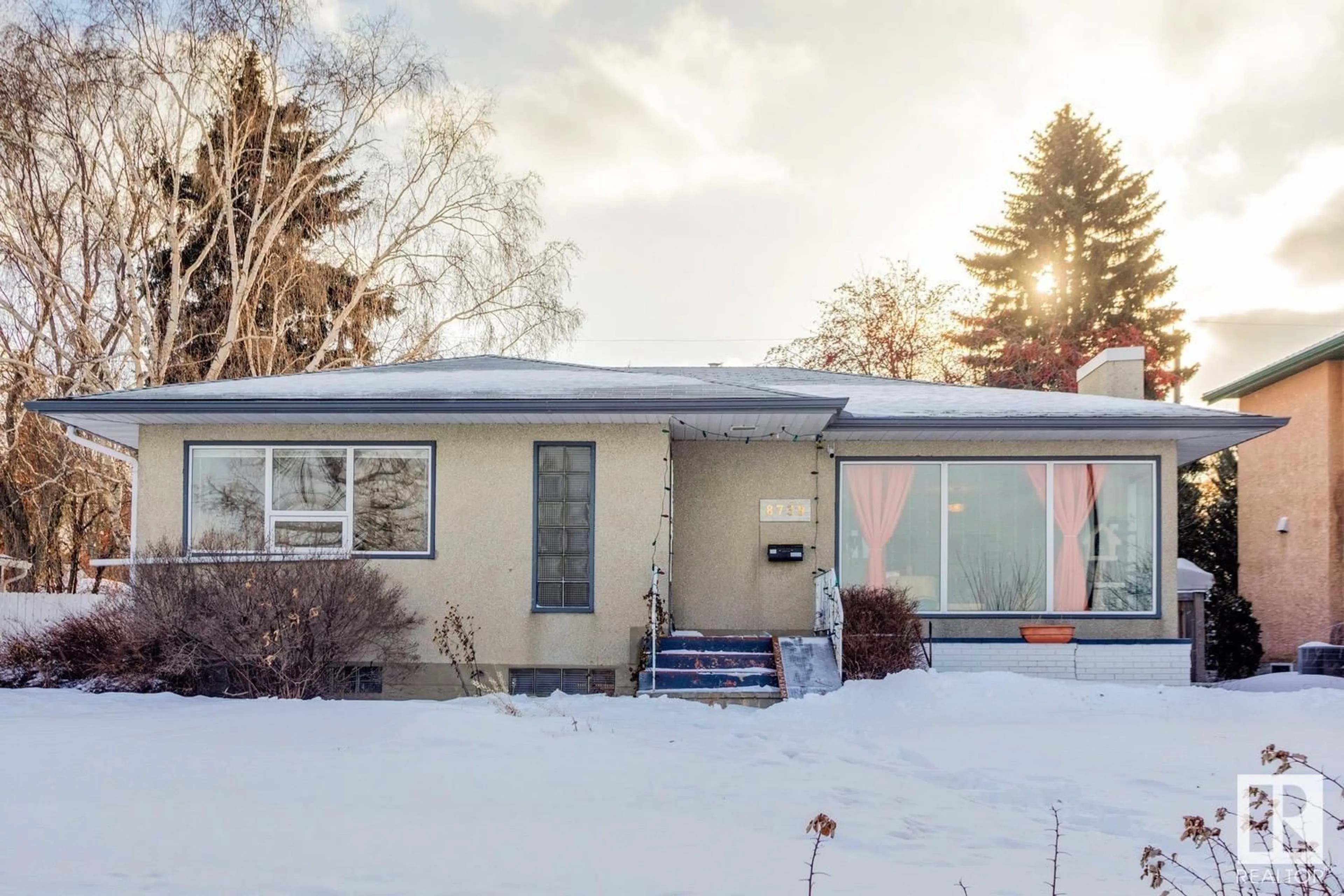 Home with vinyl exterior material, street for 8739 STRATHEARN CR NW, Edmonton Alberta T6C4C5