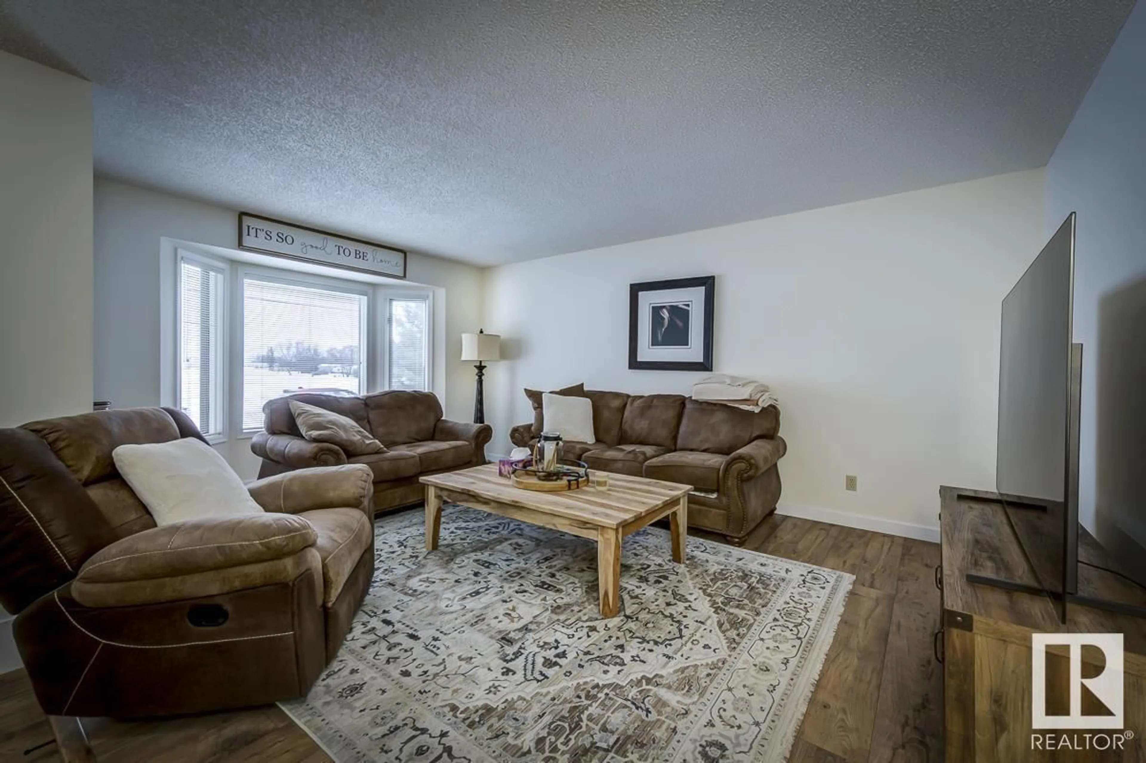 Living room with furniture, unknown for 4716 48A AV, Calmar Alberta T0C0V0