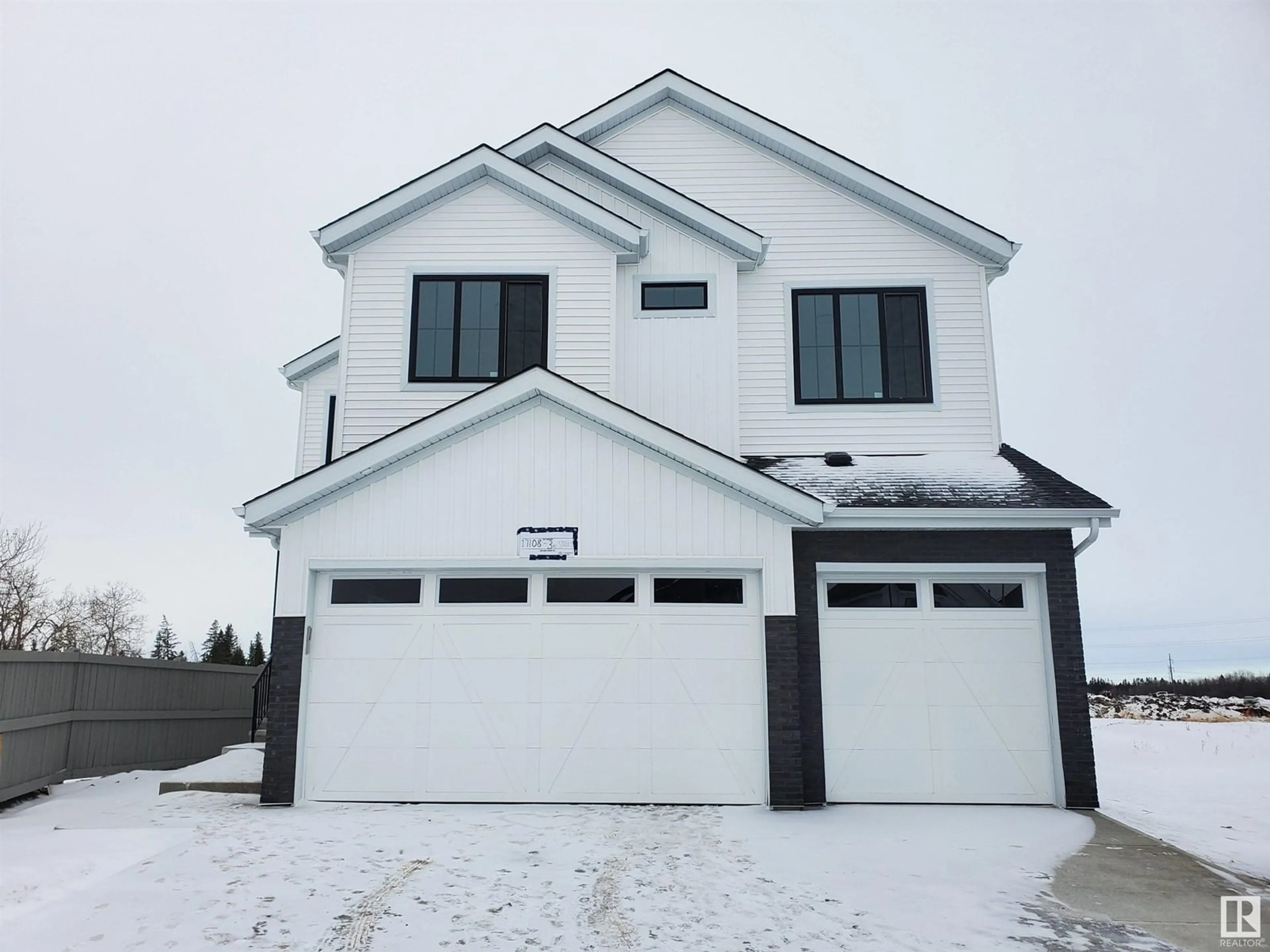 Home with vinyl exterior material, street for 17108 3 ST NW, Edmonton Alberta T5Y4G8