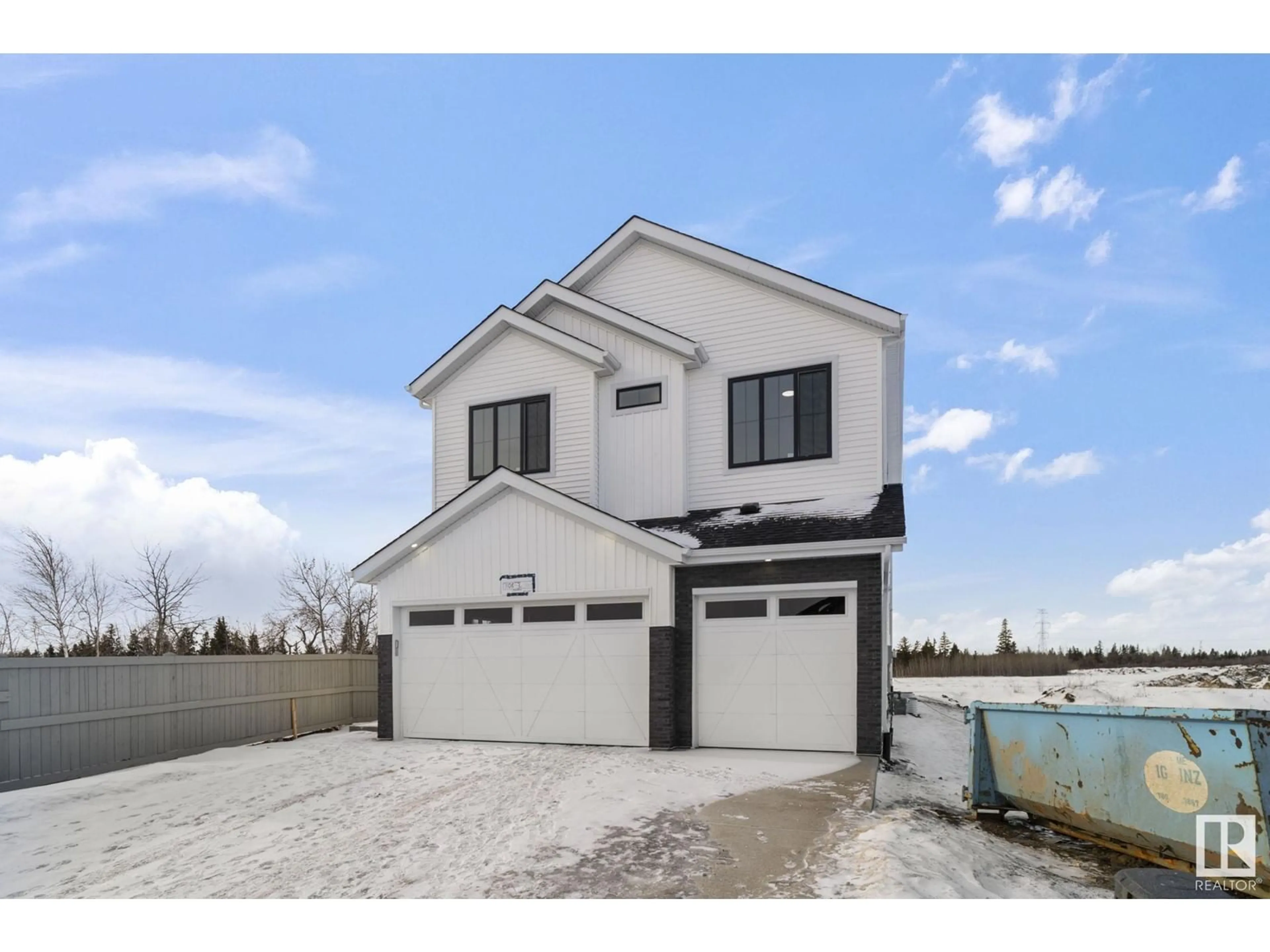 Home with vinyl exterior material, street for 17108 3 ST NW, Edmonton Alberta T5Y4G8