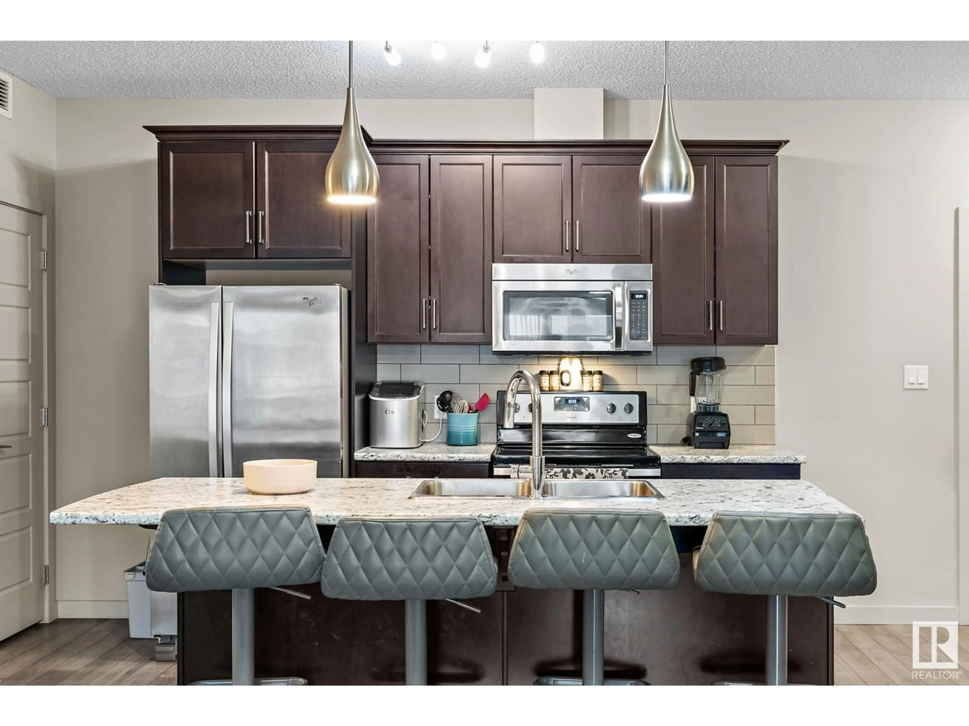 Open concept kitchen, unknown for #325 508 GRIESBACH PARADE PR NW, Edmonton Alberta T5E6V9