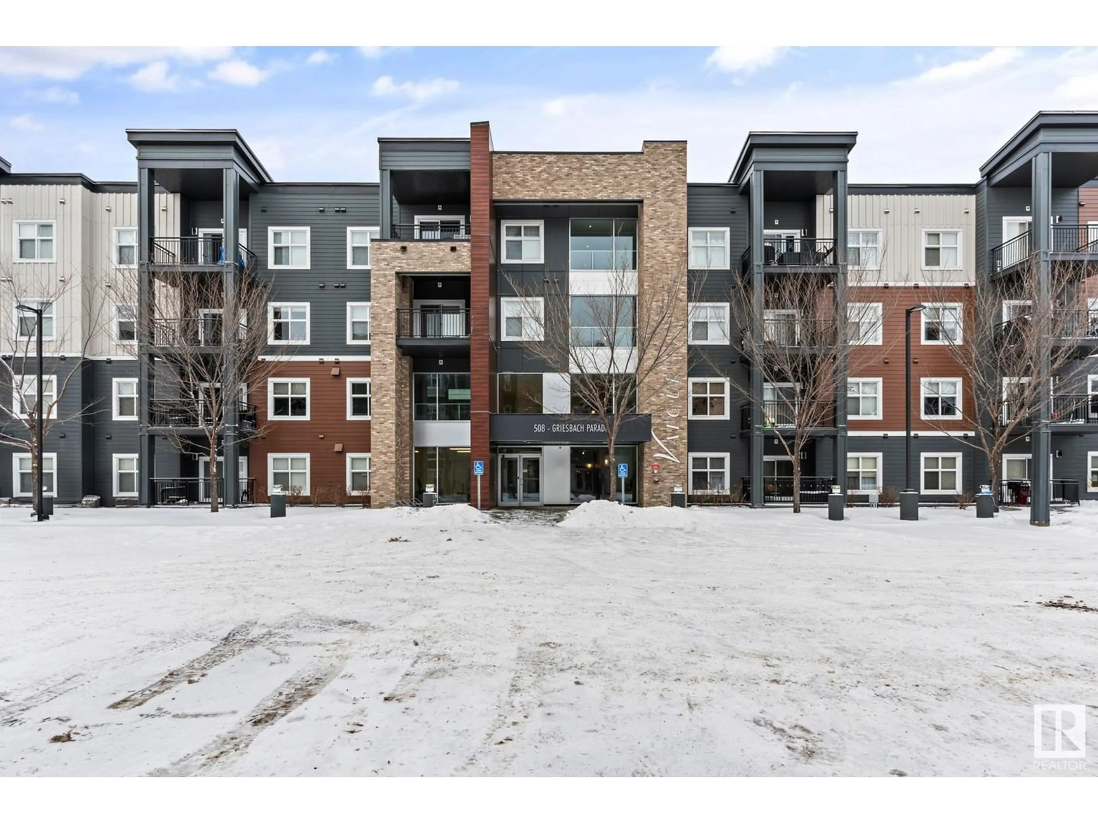 A pic from outside/outdoor area/front of a property/back of a property/a pic from drone, building for #325 508 GRIESBACH PARADE PR NW, Edmonton Alberta T5E6V9