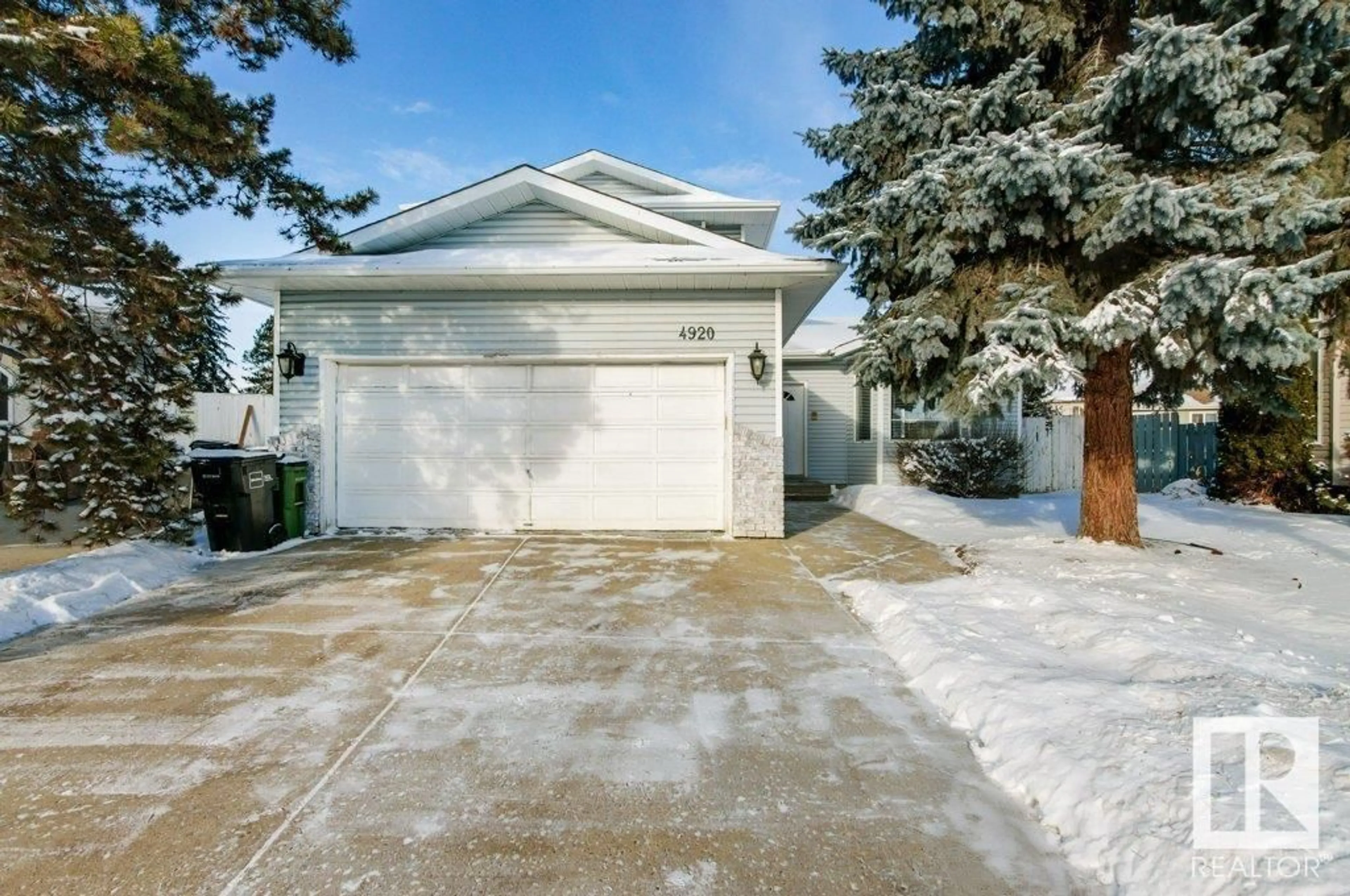 Home with vinyl exterior material, street for 4920 31 AV NW, Edmonton Alberta T6L5H6