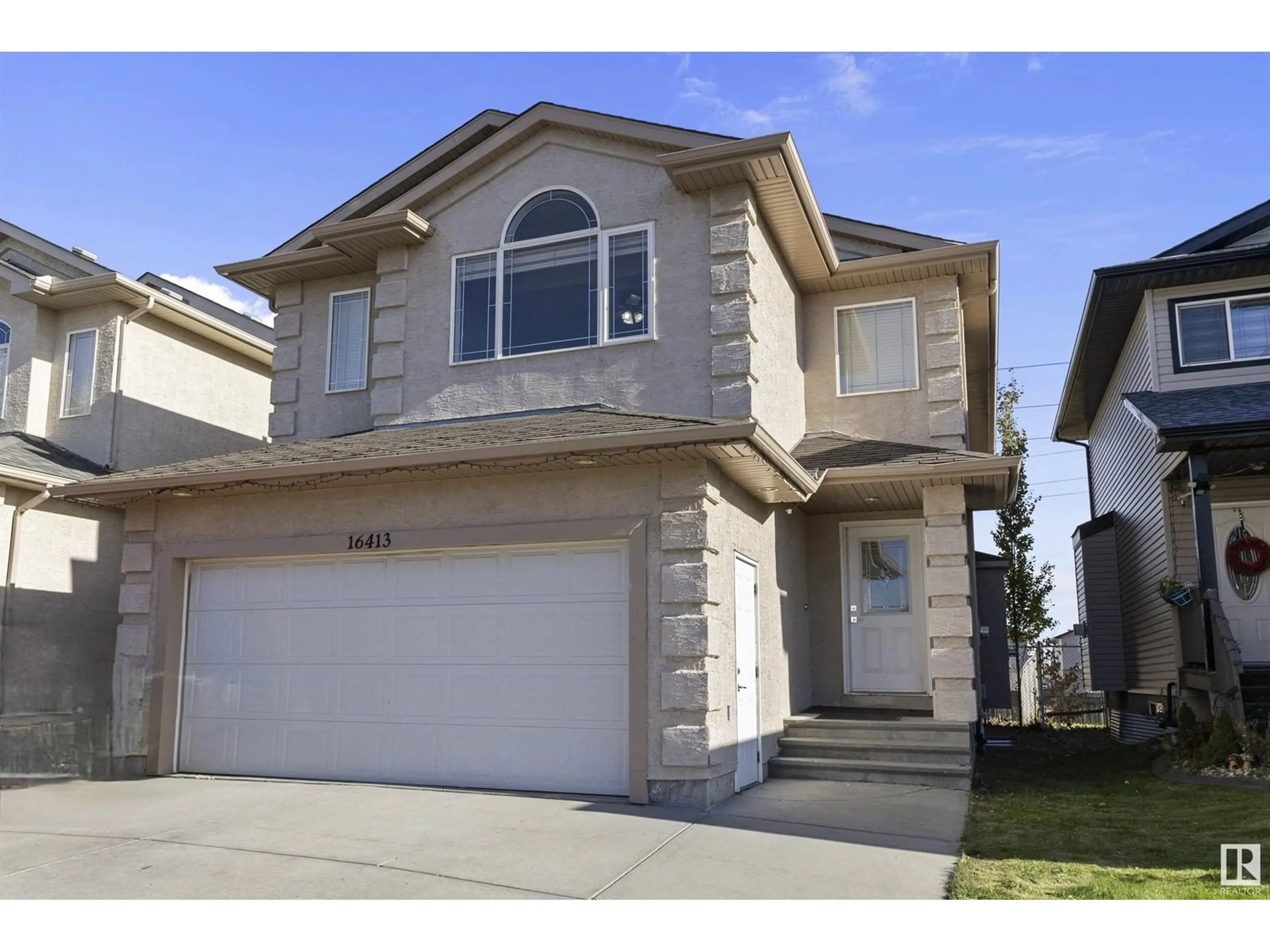 Home with vinyl exterior material, street for 16413 45 ST NW, Edmonton Alberta T5Y0A8