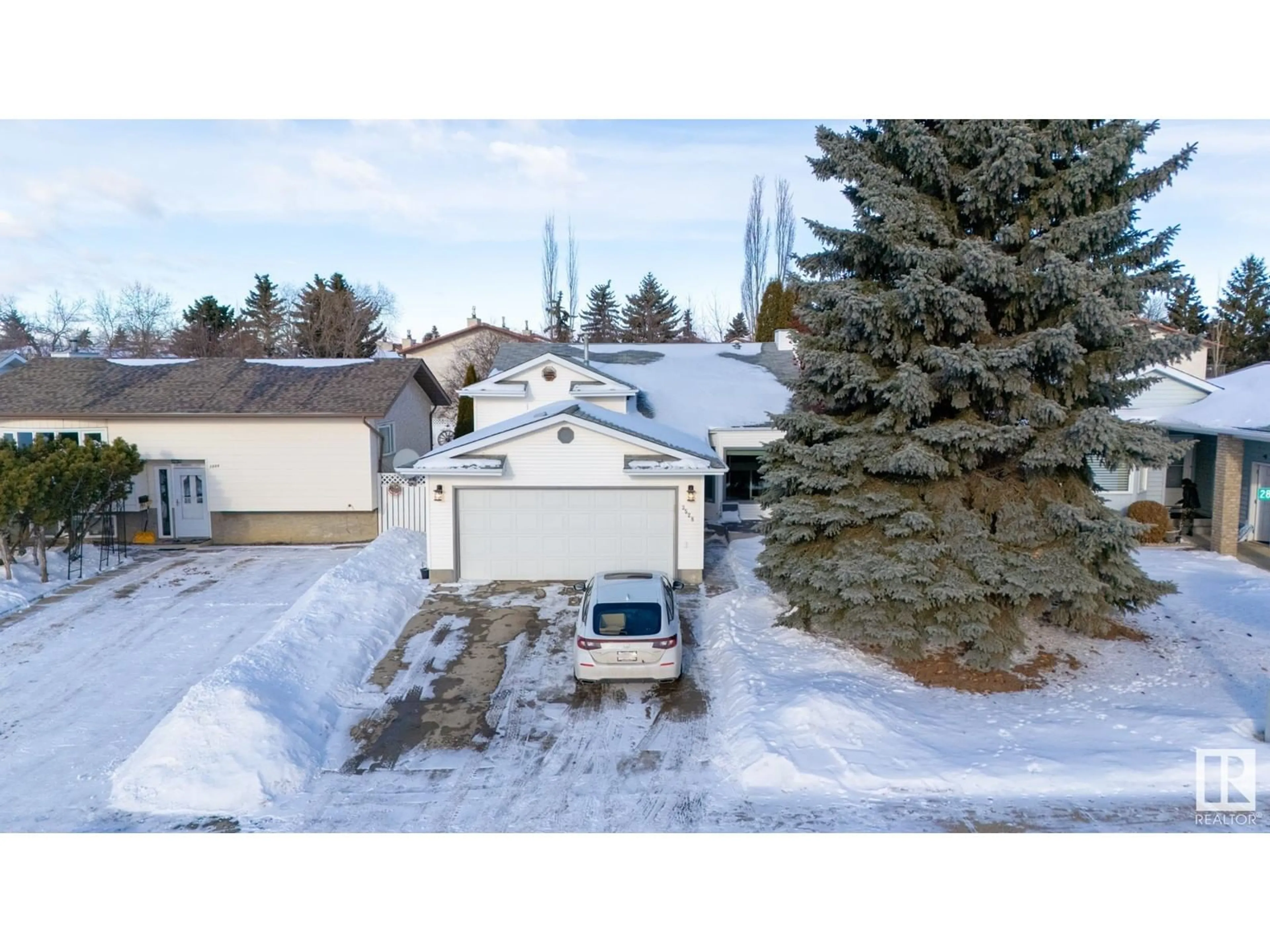 A pic from outside/outdoor area/front of a property/back of a property/a pic from drone, street for 3528 28A AV NW, Edmonton Alberta T6L4V8