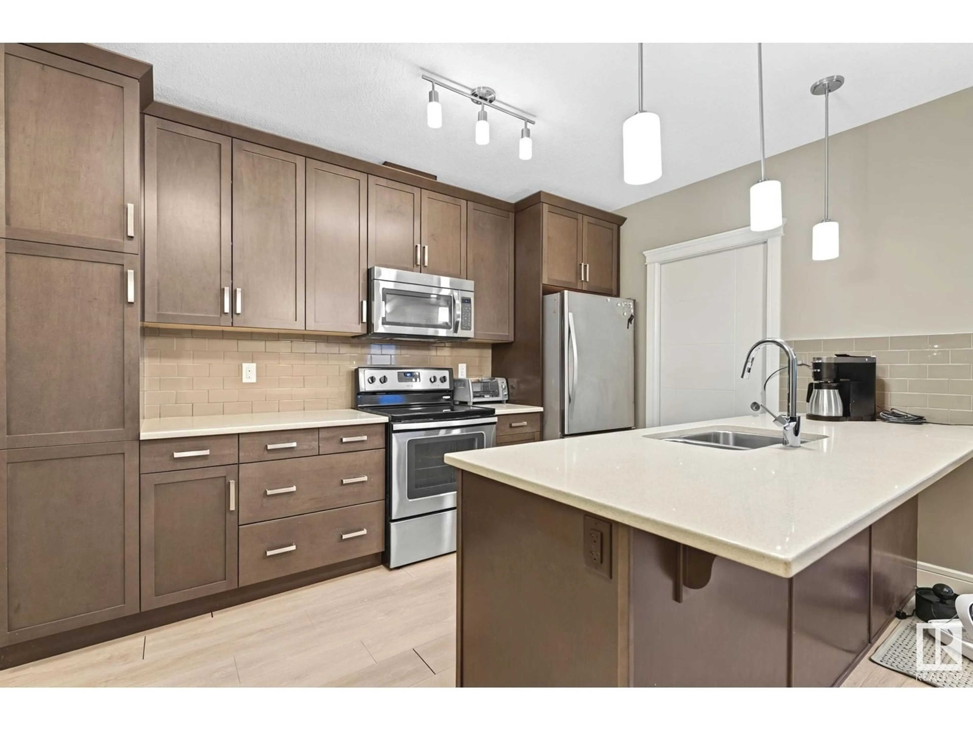 Open concept kitchen, unknown for #410 7508 GETTY GATE GA NW, Edmonton Alberta T5T7E6