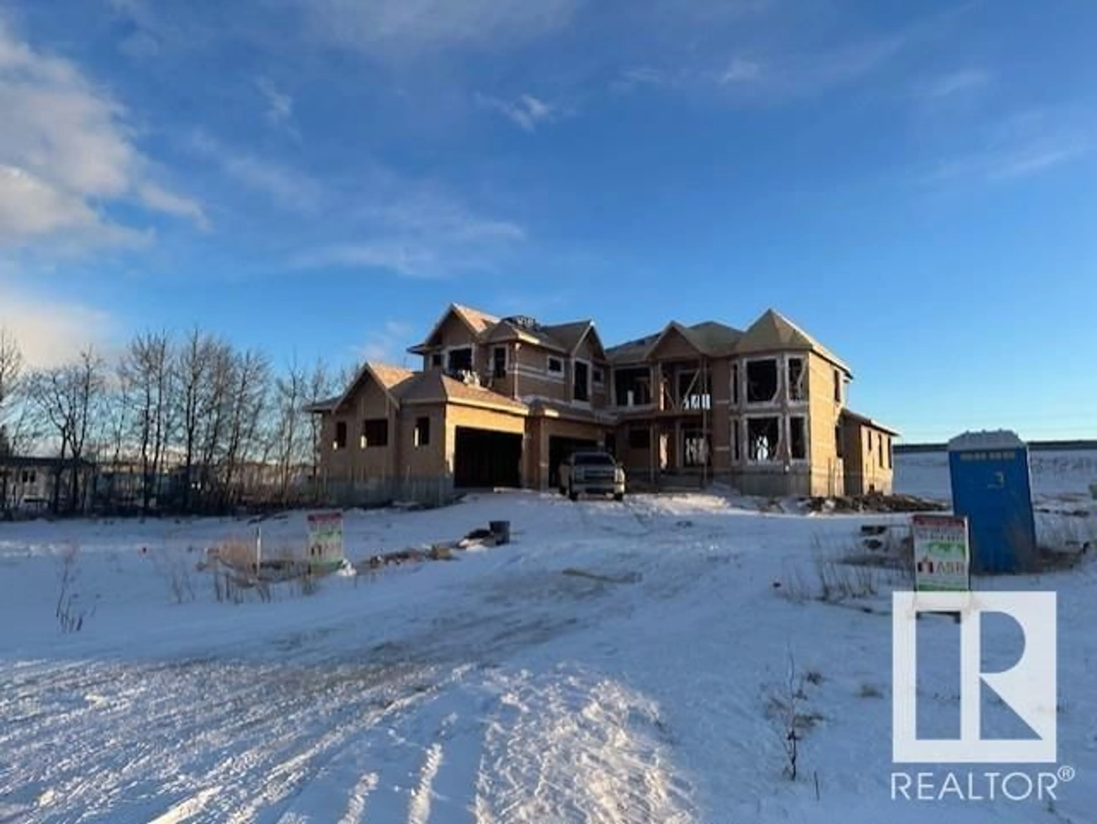 A pic from outside/outdoor area/front of a property/back of a property/a pic from drone, building for 76 26409 TWP RD 532A, Rural Parkland County Alberta T7X0W7