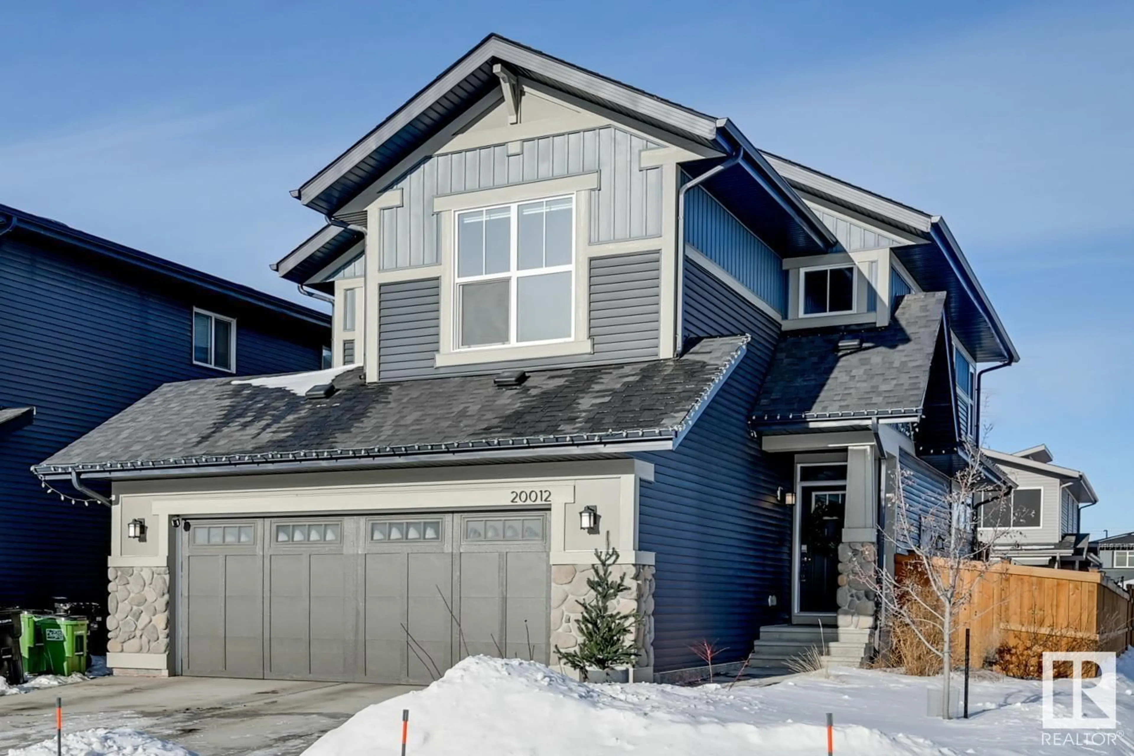 Home with vinyl exterior material, street for 20012 28 AV NW, Edmonton Alberta T6M0W8