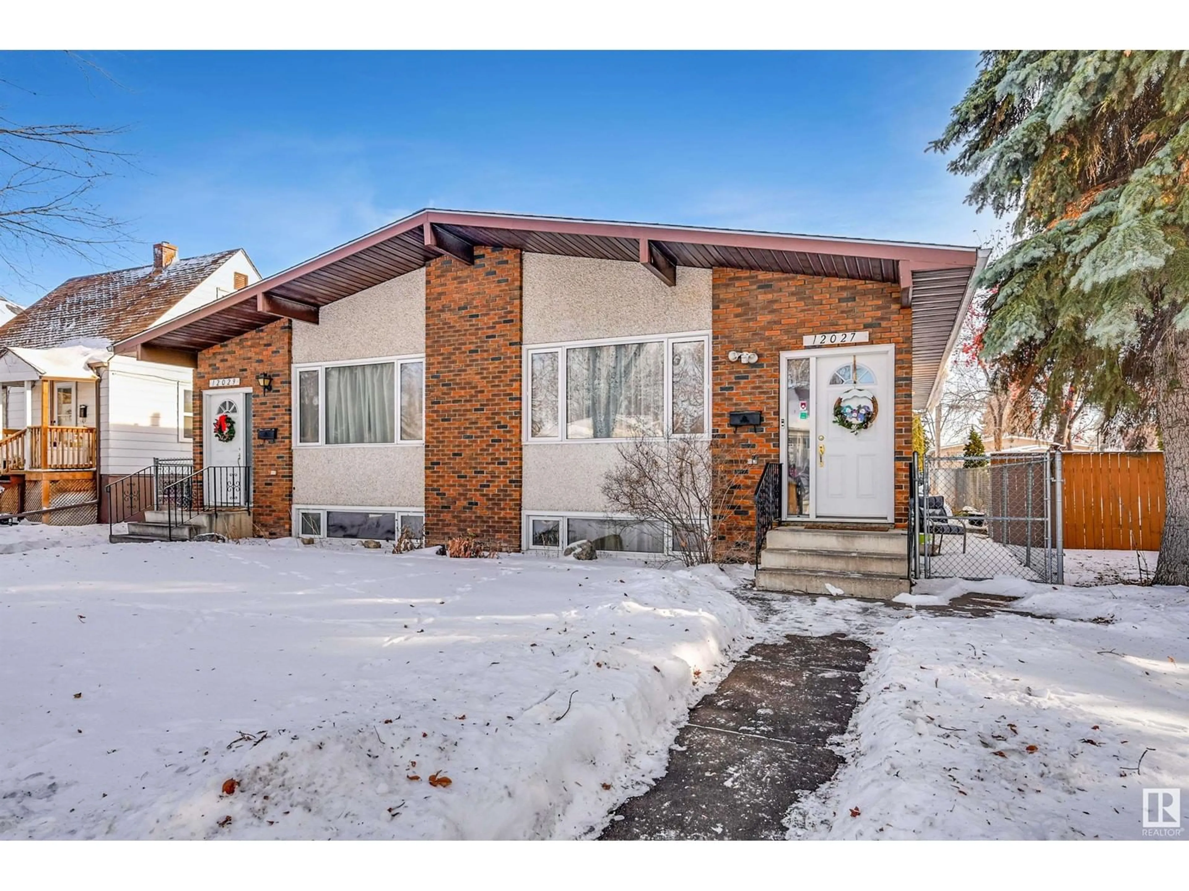 Home with brick exterior material, street for 12027 104 ST NW, Edmonton Alberta T5G2L5