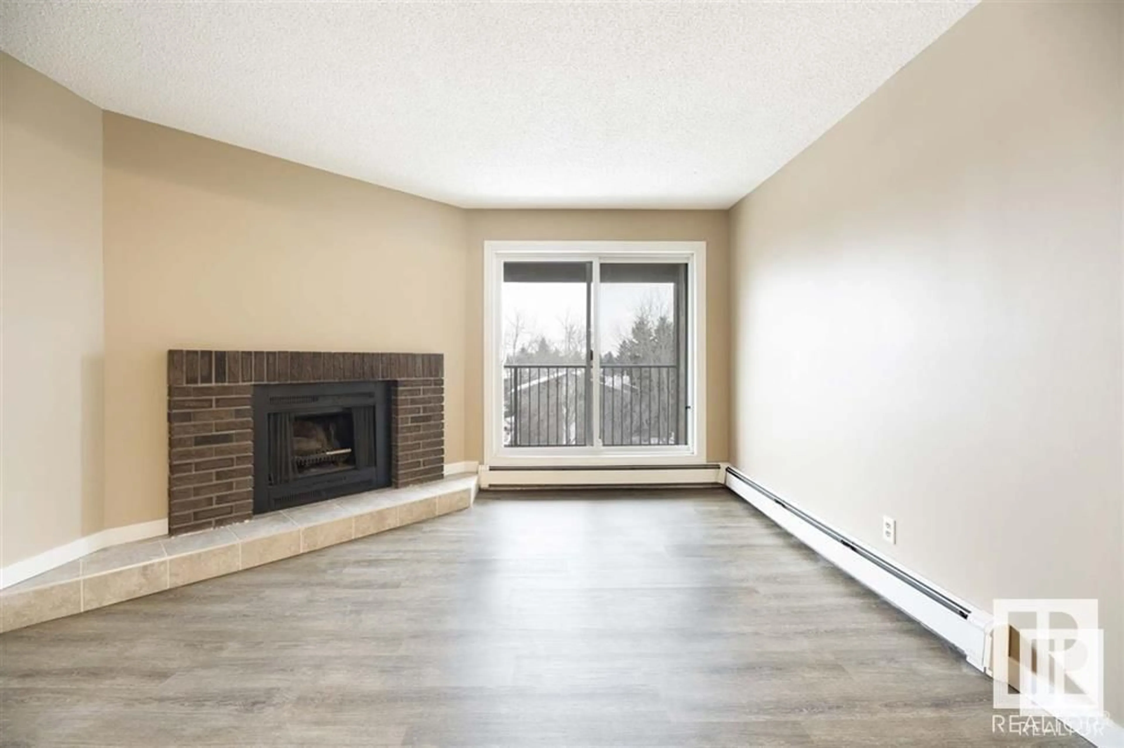 Living room with furniture, wood/laminate floor for 8041 Tudor GL, St. Albert Alberta T8N3V3