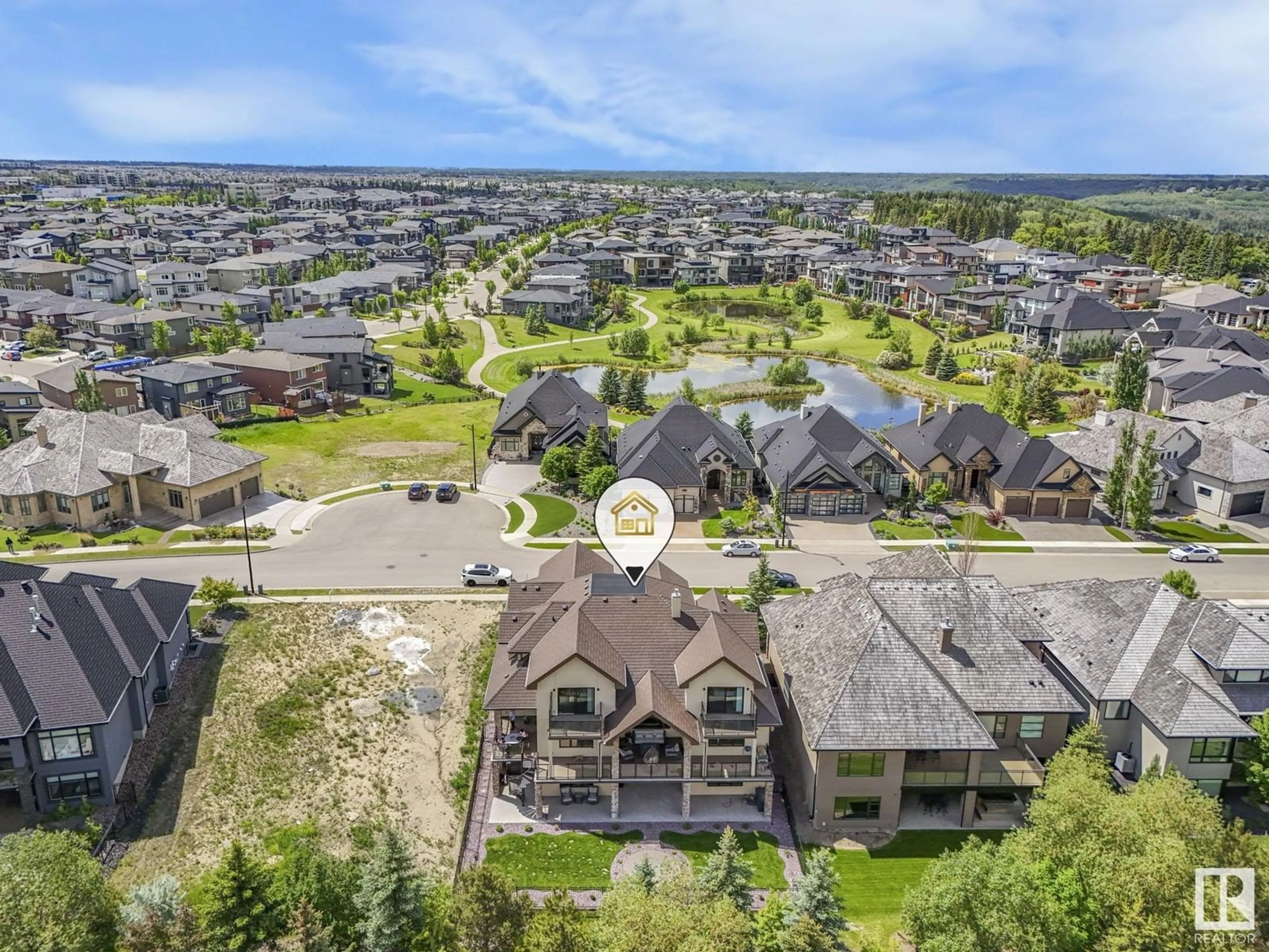 A pic from outside/outdoor area/front of a property/back of a property/a pic from drone, mountain view for 2793 Wheaton DR NW, Edmonton Alberta T6W2M6