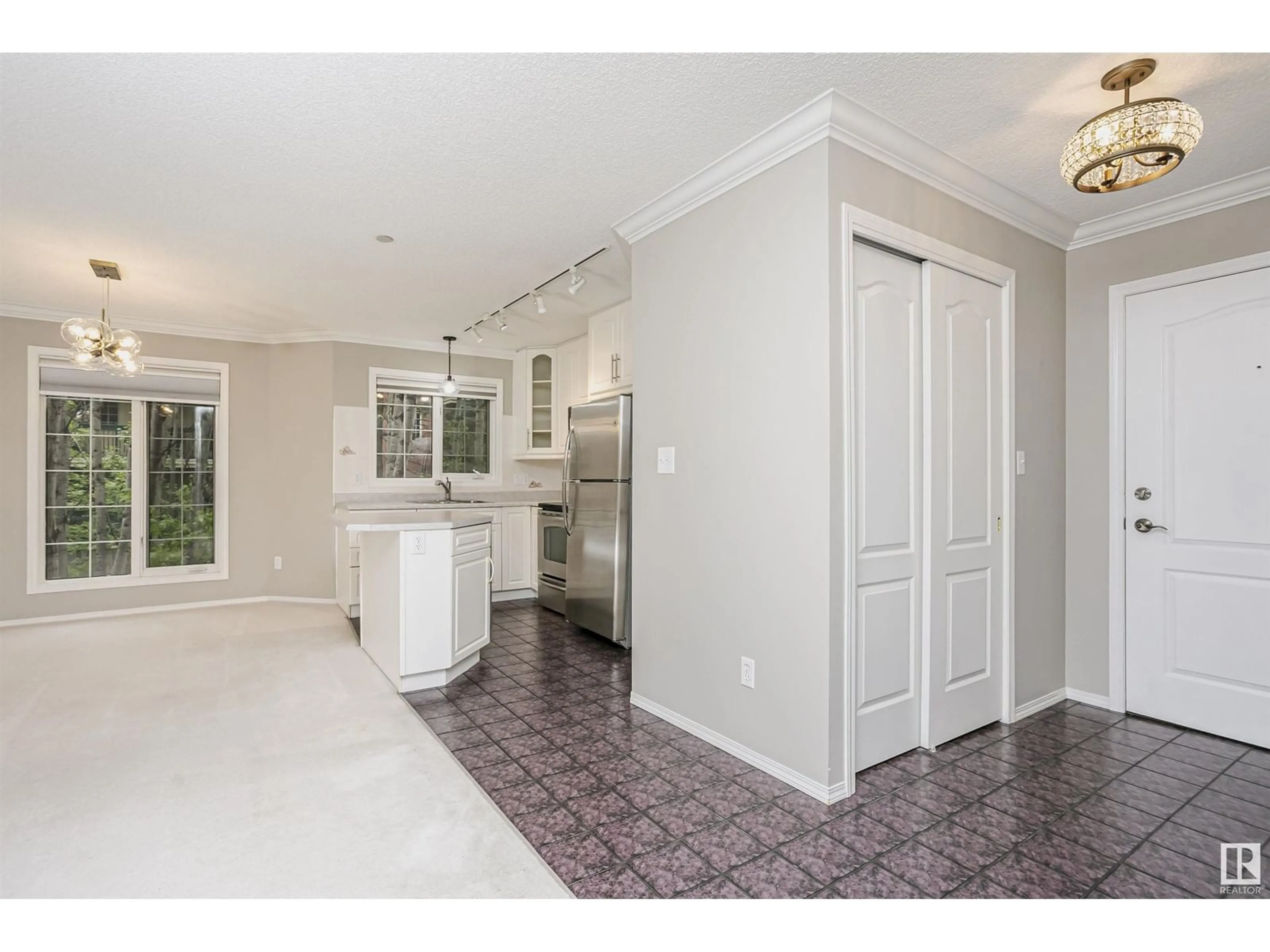 Open concept kitchen, ceramic/tile floor for #202 20 St Joseph ST, St. Albert Alberta T8N6M5