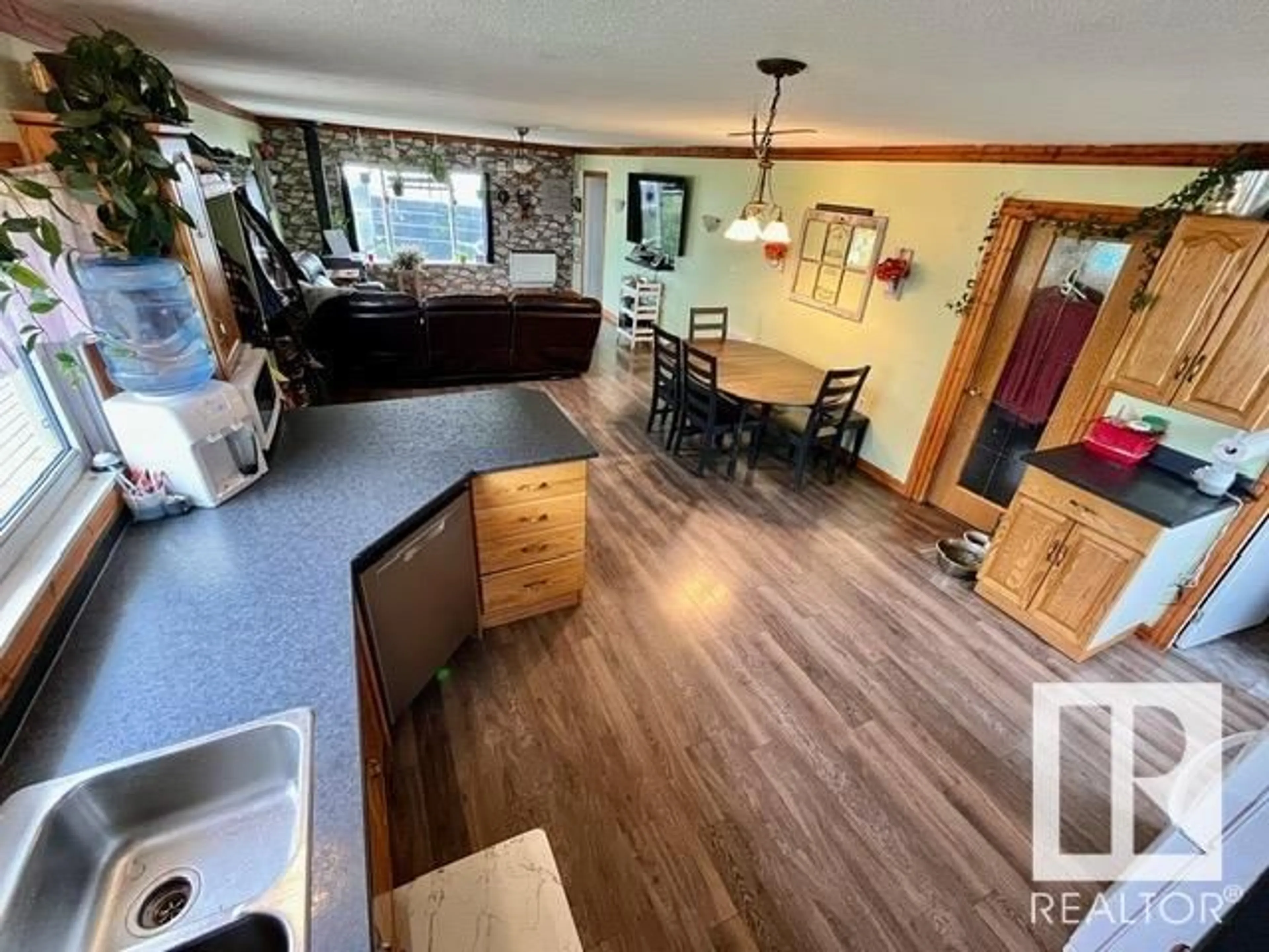 Open concept kitchen, wood/laminate floor for 5320 Pyrogy DR, Glendon Alberta T0A1P0