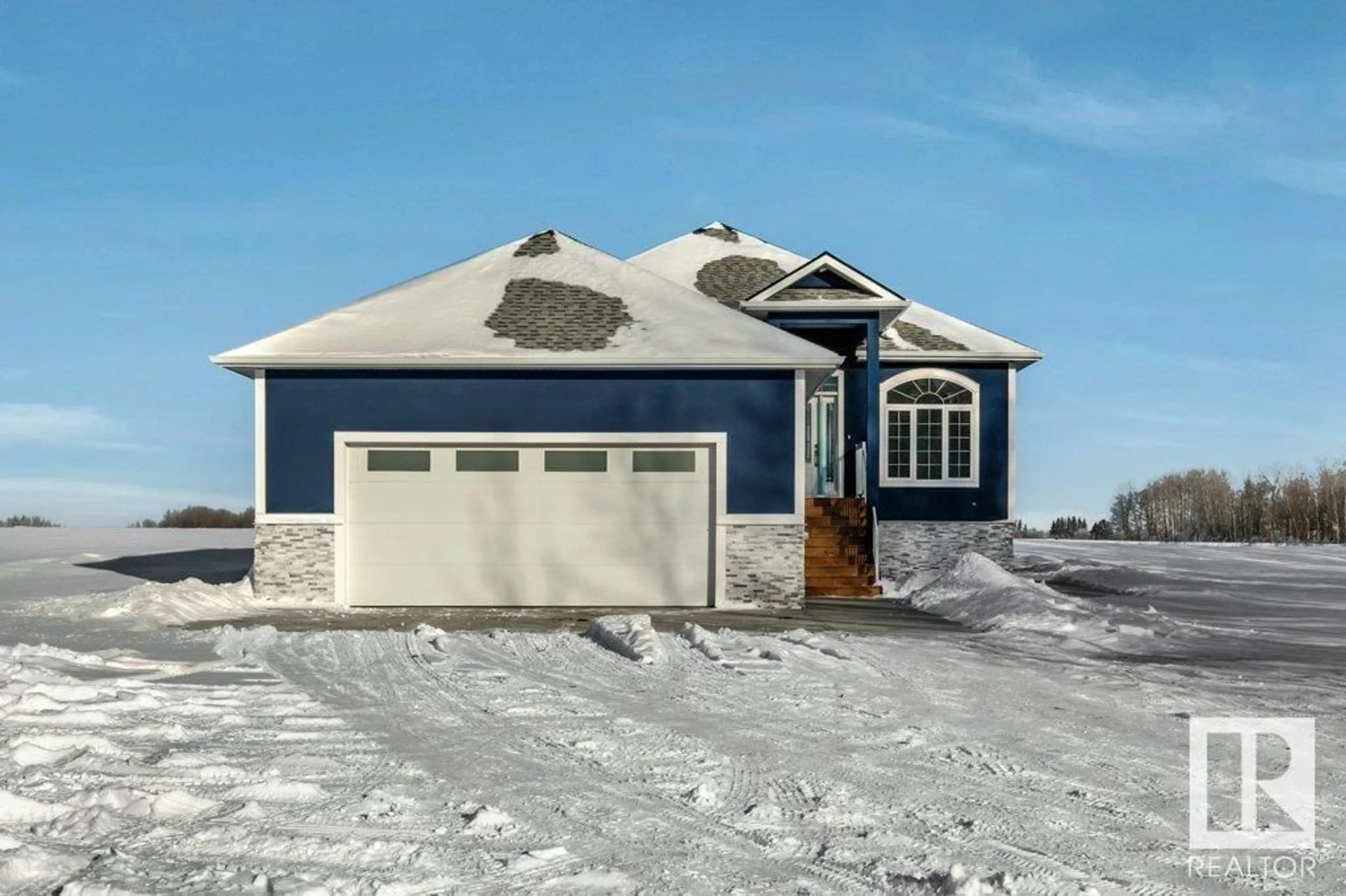 Home with vinyl exterior material, street for 10 243060 Twp 470, Rural Wetaskiwin County Alberta T9A1W8