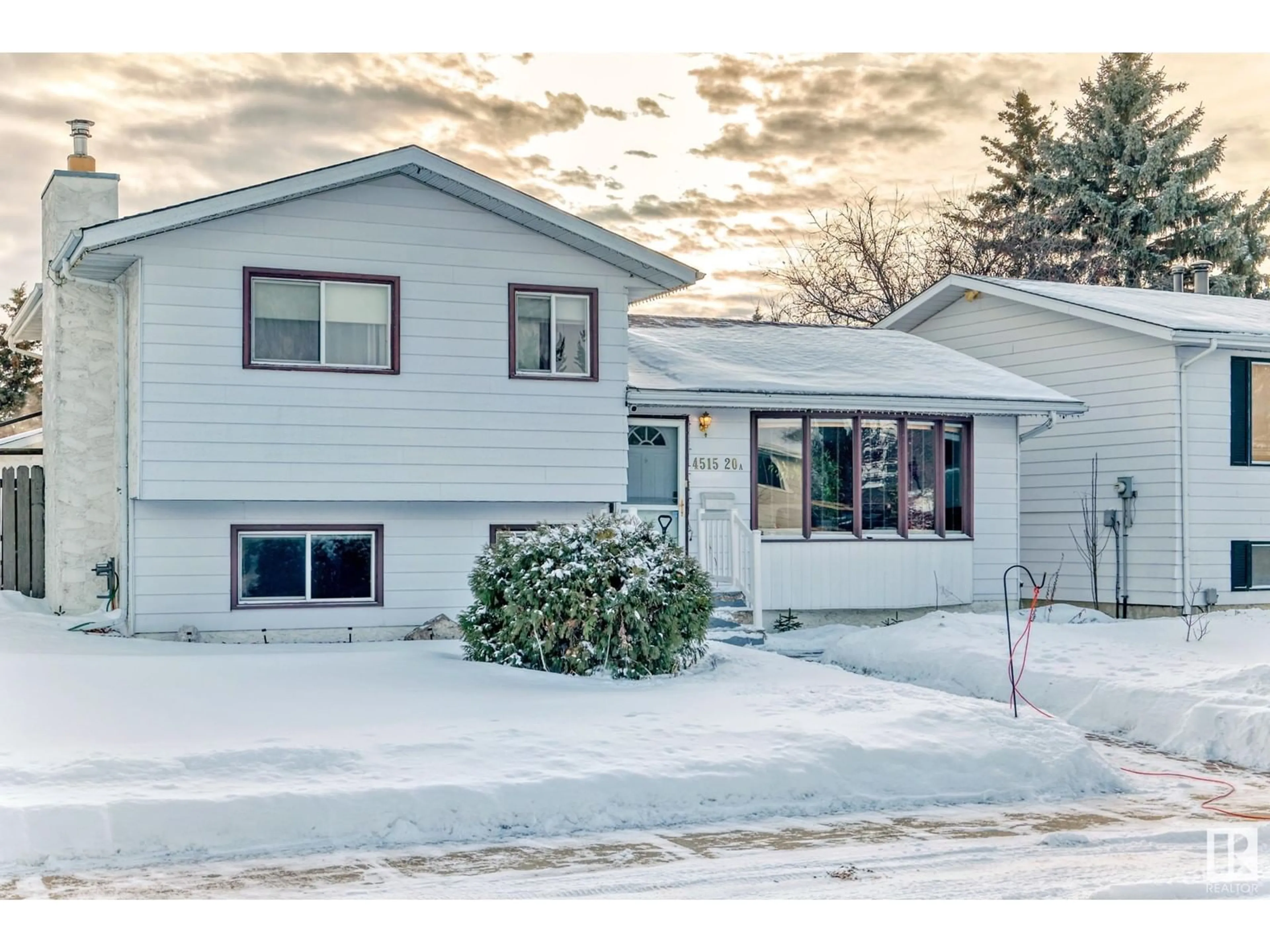 Home with vinyl exterior material, street for 4515 20A AV NW, Edmonton Alberta T6L2V2