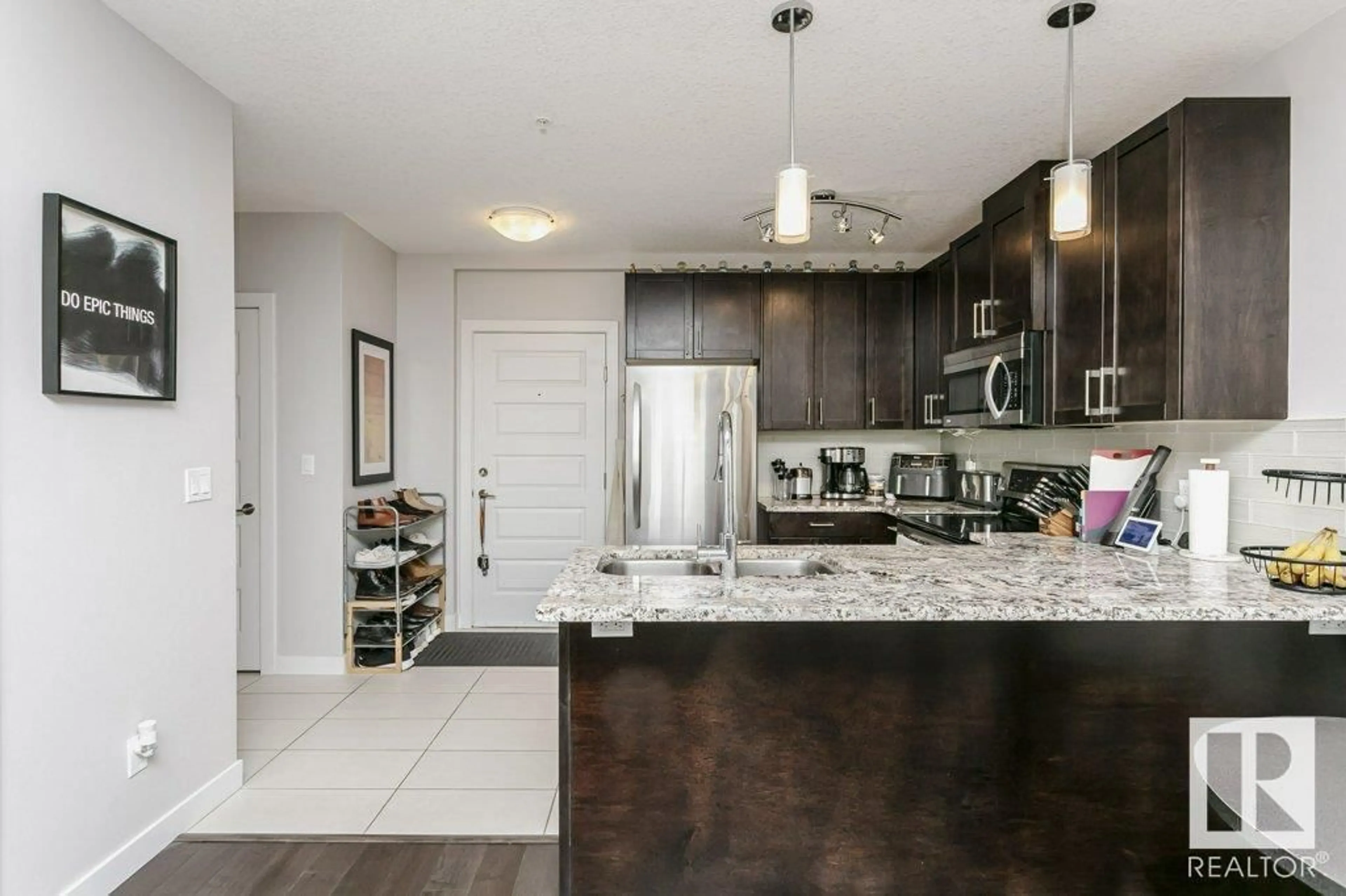 Open concept kitchen, ceramic/tile floor for #333 5151 WINDERMERE BV SW, Edmonton Alberta T6W2K4