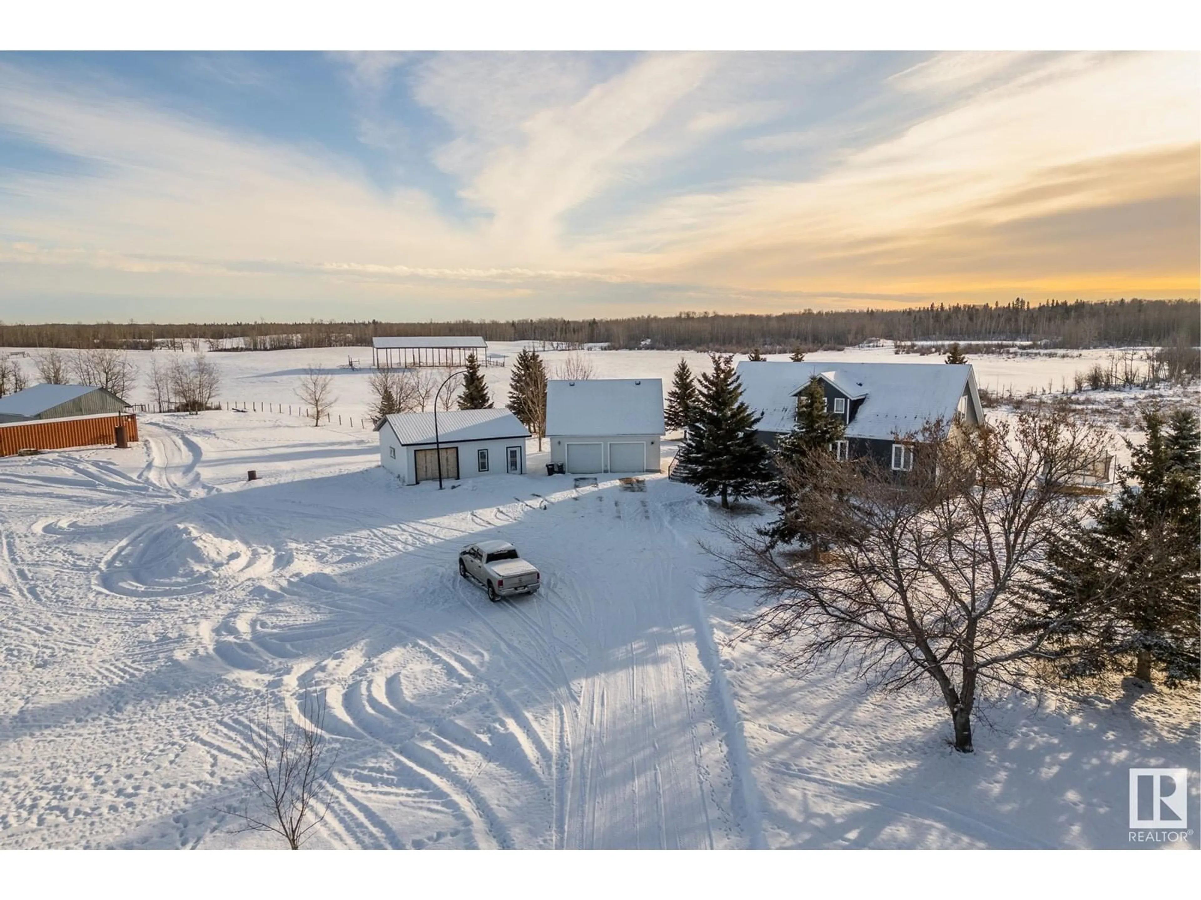 A pic from outside/outdoor area/front of a property/back of a property/a pic from drone, unknown for 20335 TWP ROAD 544, Rural Strathcona County Alberta T8L3Z3