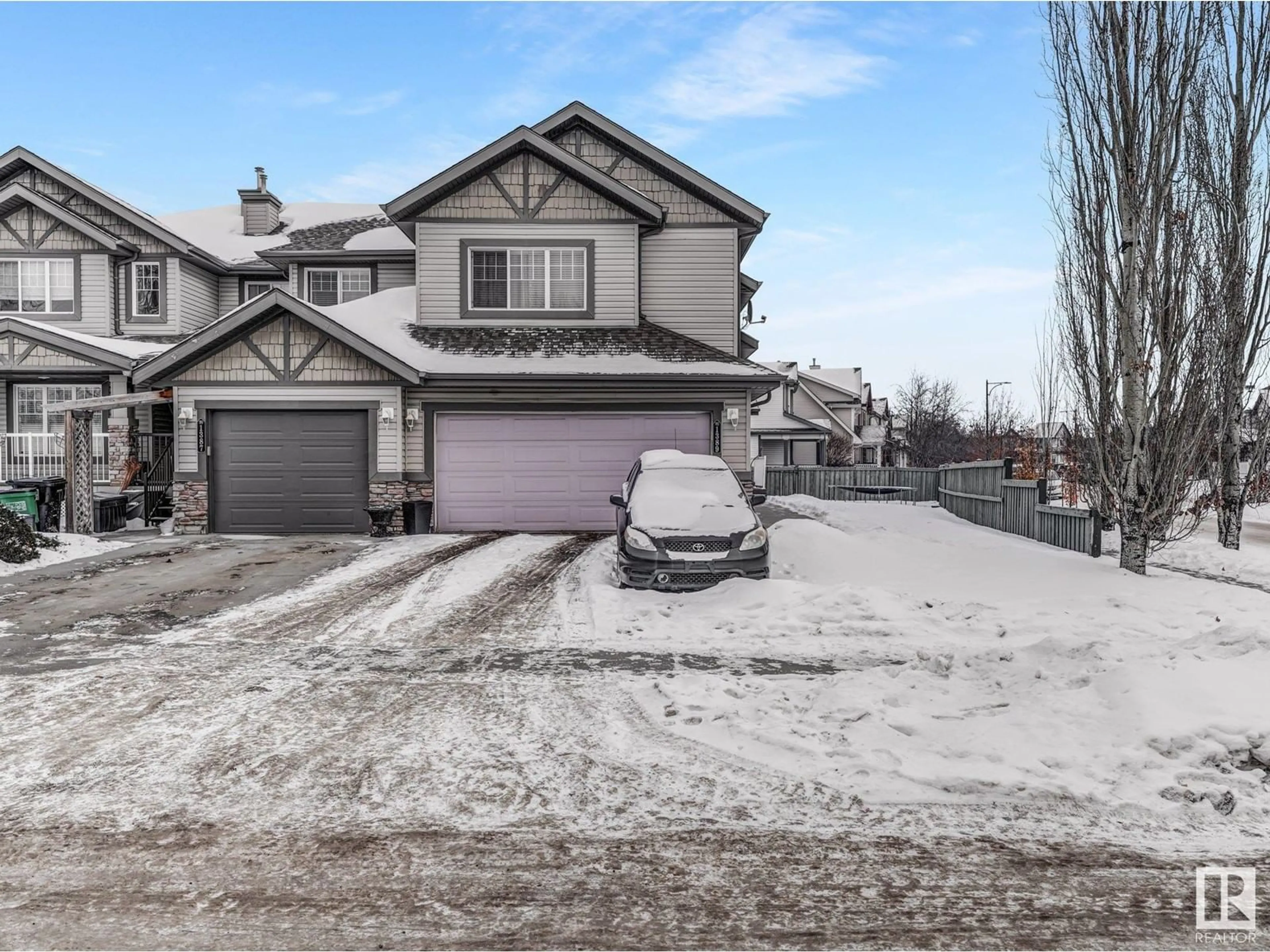 A pic from outside/outdoor area/front of a property/back of a property/a pic from drone, street for 1389 Rutherford Road SW, Edmonton Alberta T6W1T8