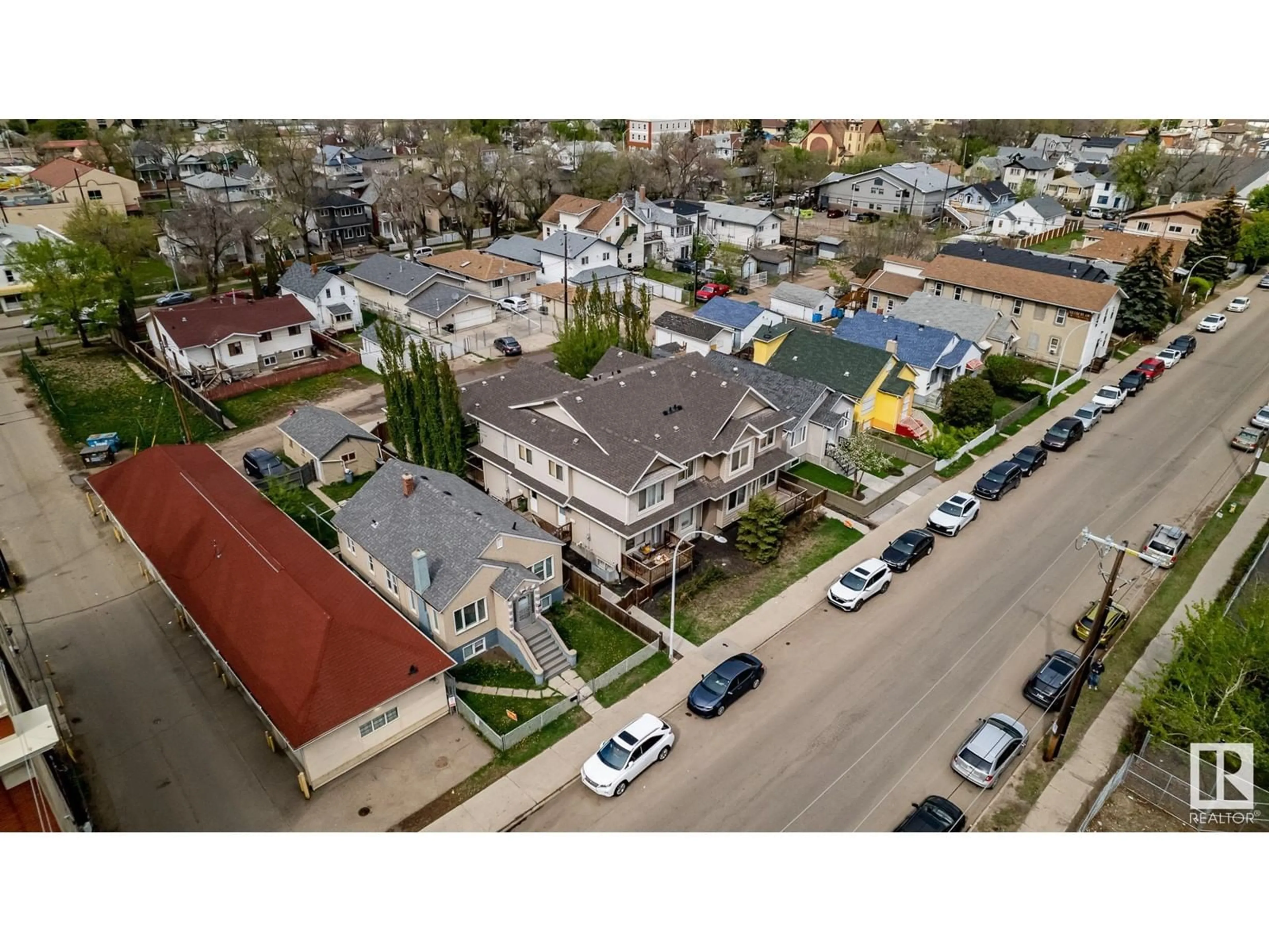 A pic from outside/outdoor area/front of a property/back of a property/a pic from drone, street for 9648 106 AV NW, Edmonton Alberta T5H0N4