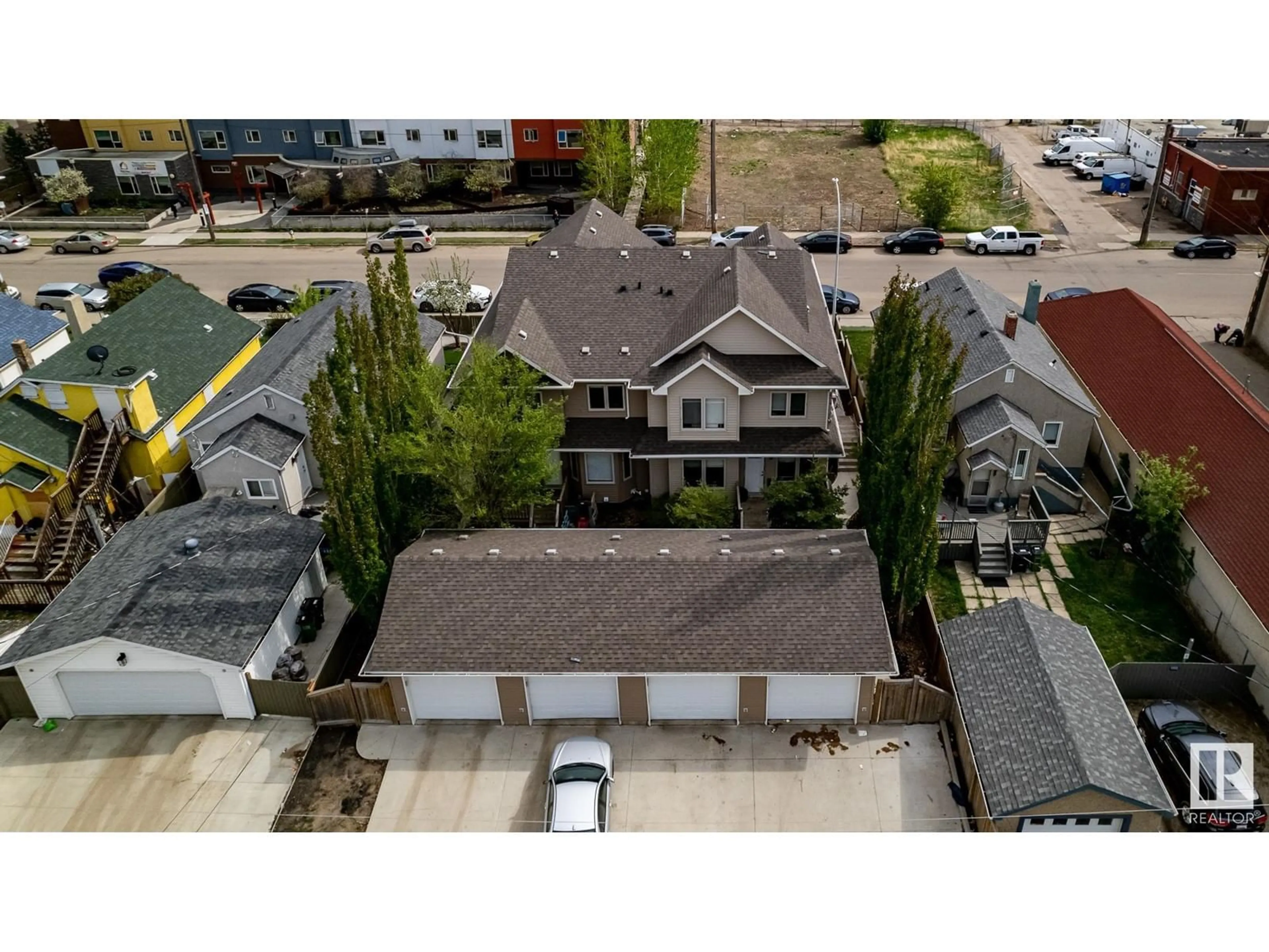 A pic from outside/outdoor area/front of a property/back of a property/a pic from drone, street for 9648 106 AV NW, Edmonton Alberta T5H0N4