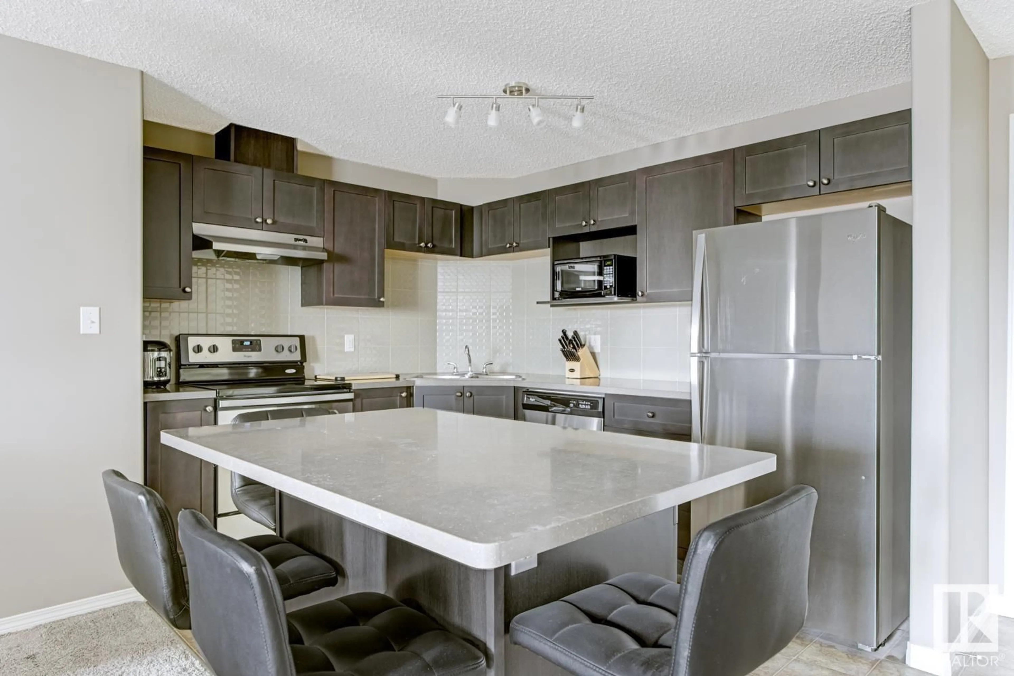 Open concept kitchen, unknown for #201 1520 HAMMOND GA NW, Edmonton Alberta T6M0J4