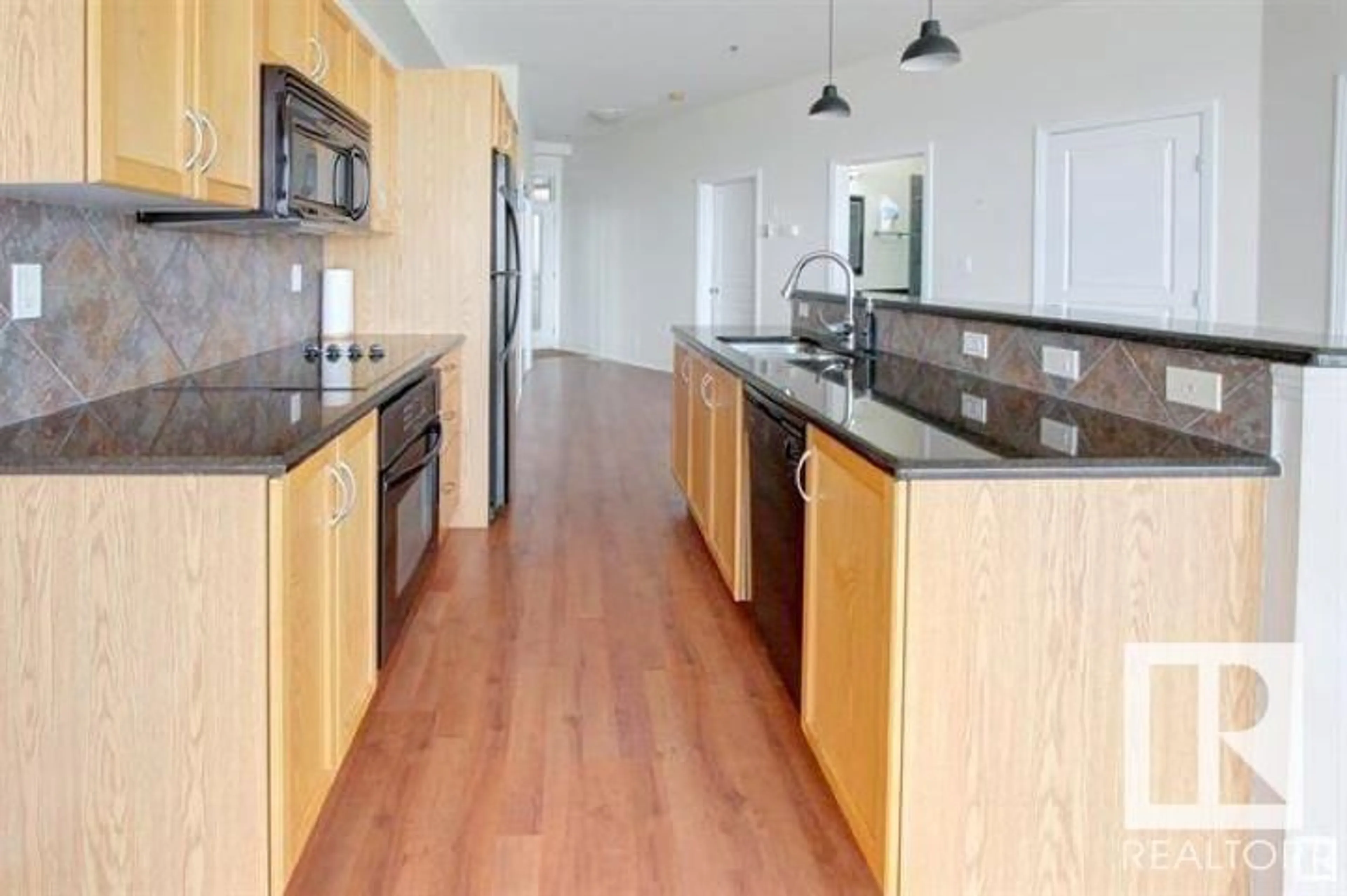 Open concept kitchen, unknown for #307 4835 104A ST NW, Edmonton Alberta T6H0R5