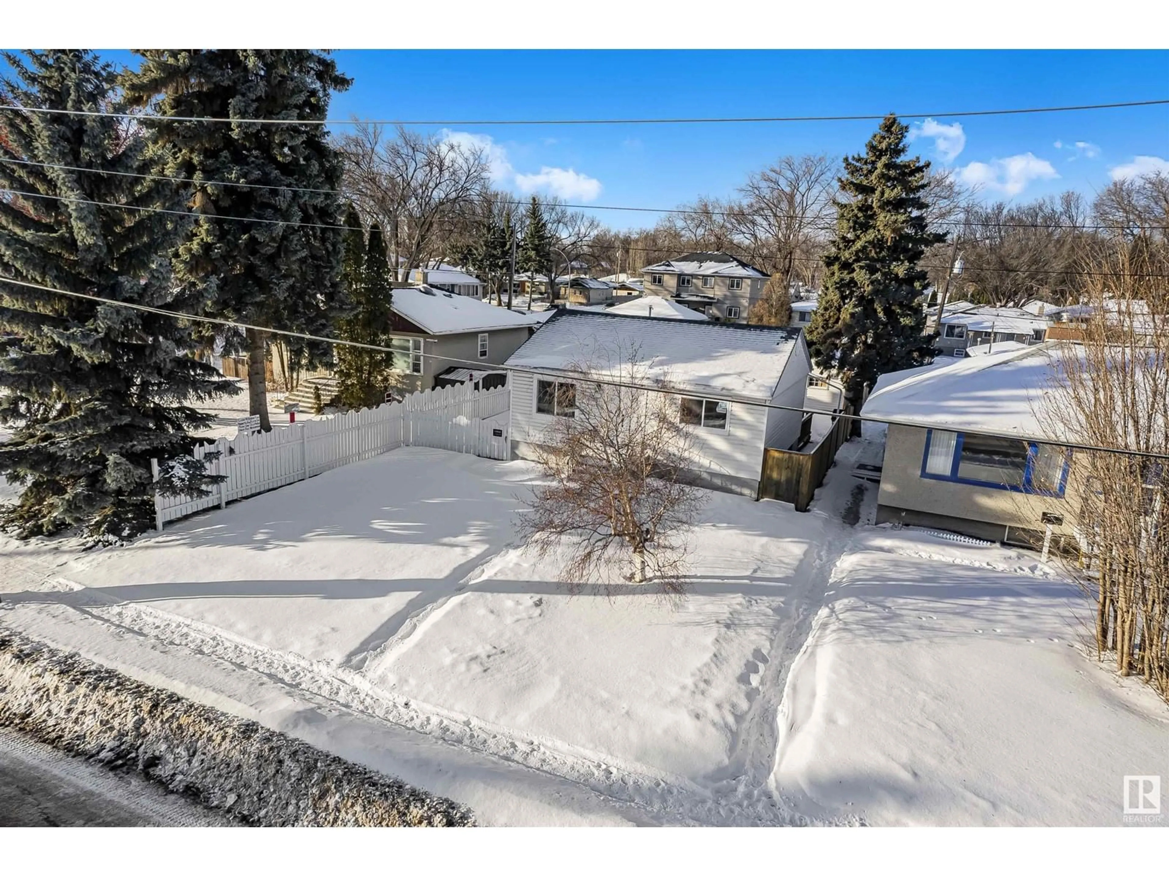 A pic from outside/outdoor area/front of a property/back of a property/a pic from drone, street for 11906 50 street NW, Edmonton Alberta T5W3C2