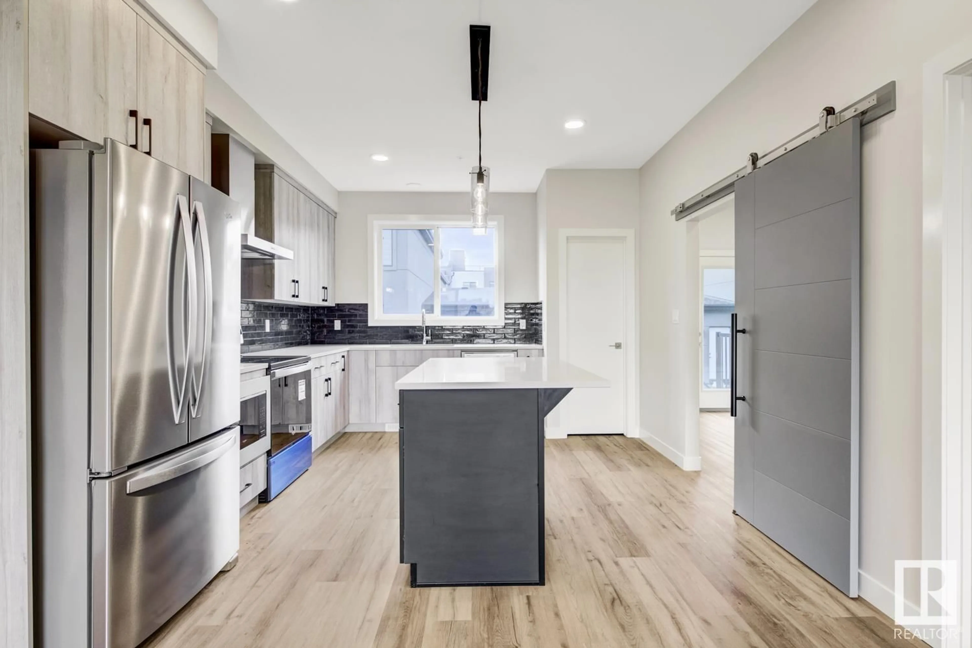 Open concept kitchen, unknown for 8063 CEDRIC MAH RD, Edmonton Alberta T5G2Z4
