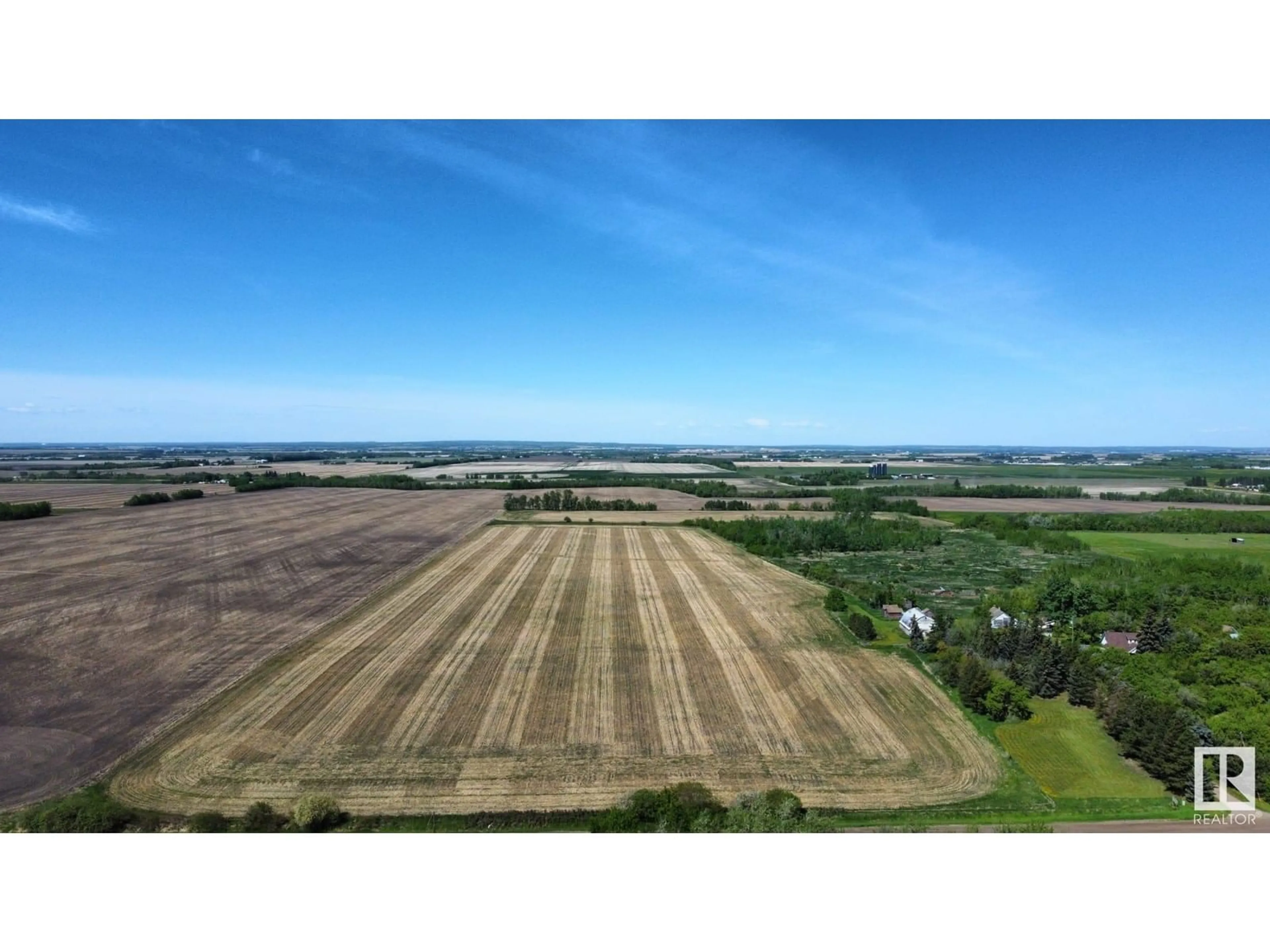 A pic from outside/outdoor area/front of a property/back of a property/a pic from drone, mountain view for 54230 RR 255, St. Albert Alberta T8T0T6