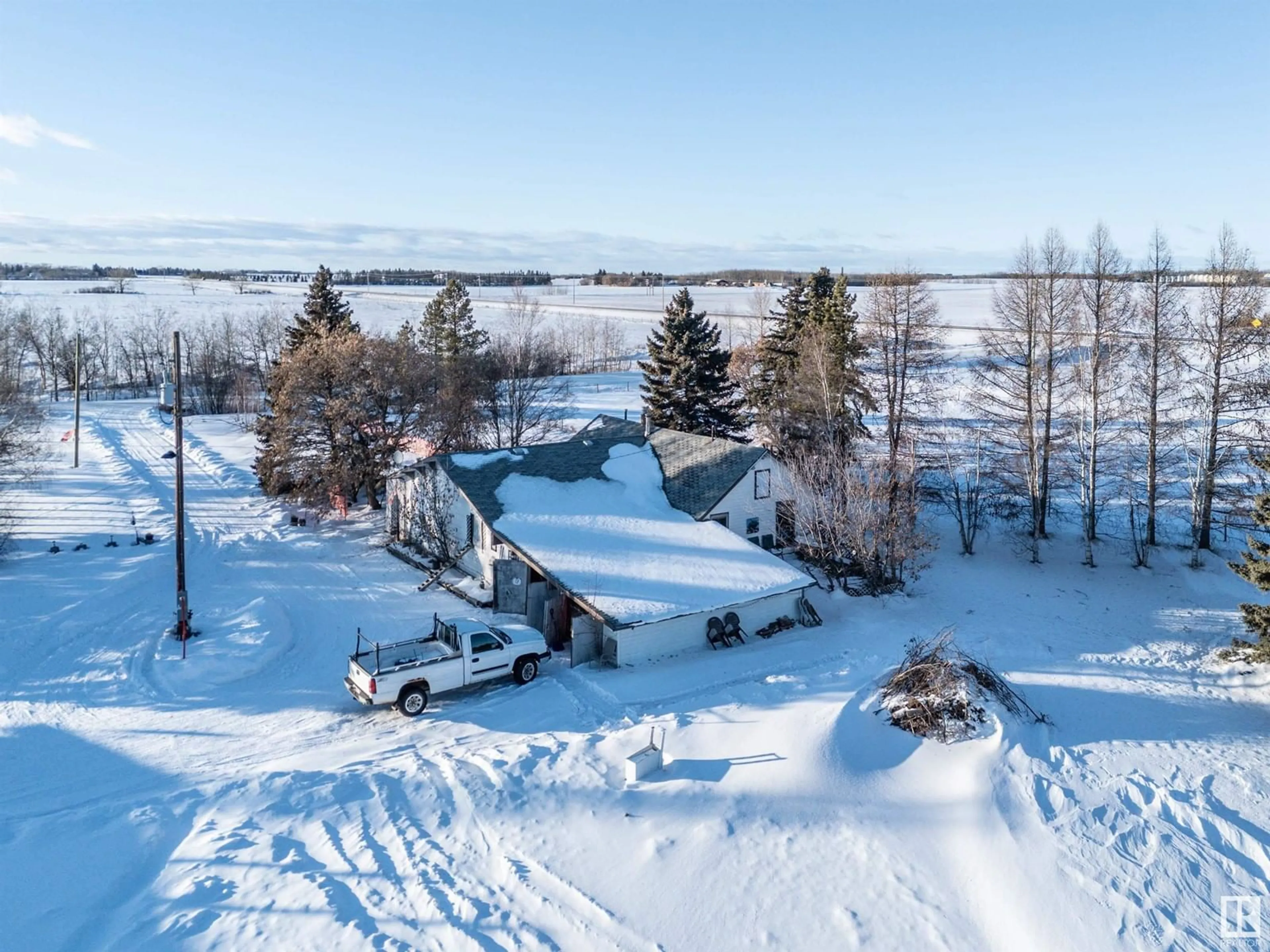 A pic from outside/outdoor area/front of a property/back of a property/a pic from drone, unknown for 54529 RR 255, Rural Sturgeon County Alberta T8T0V2