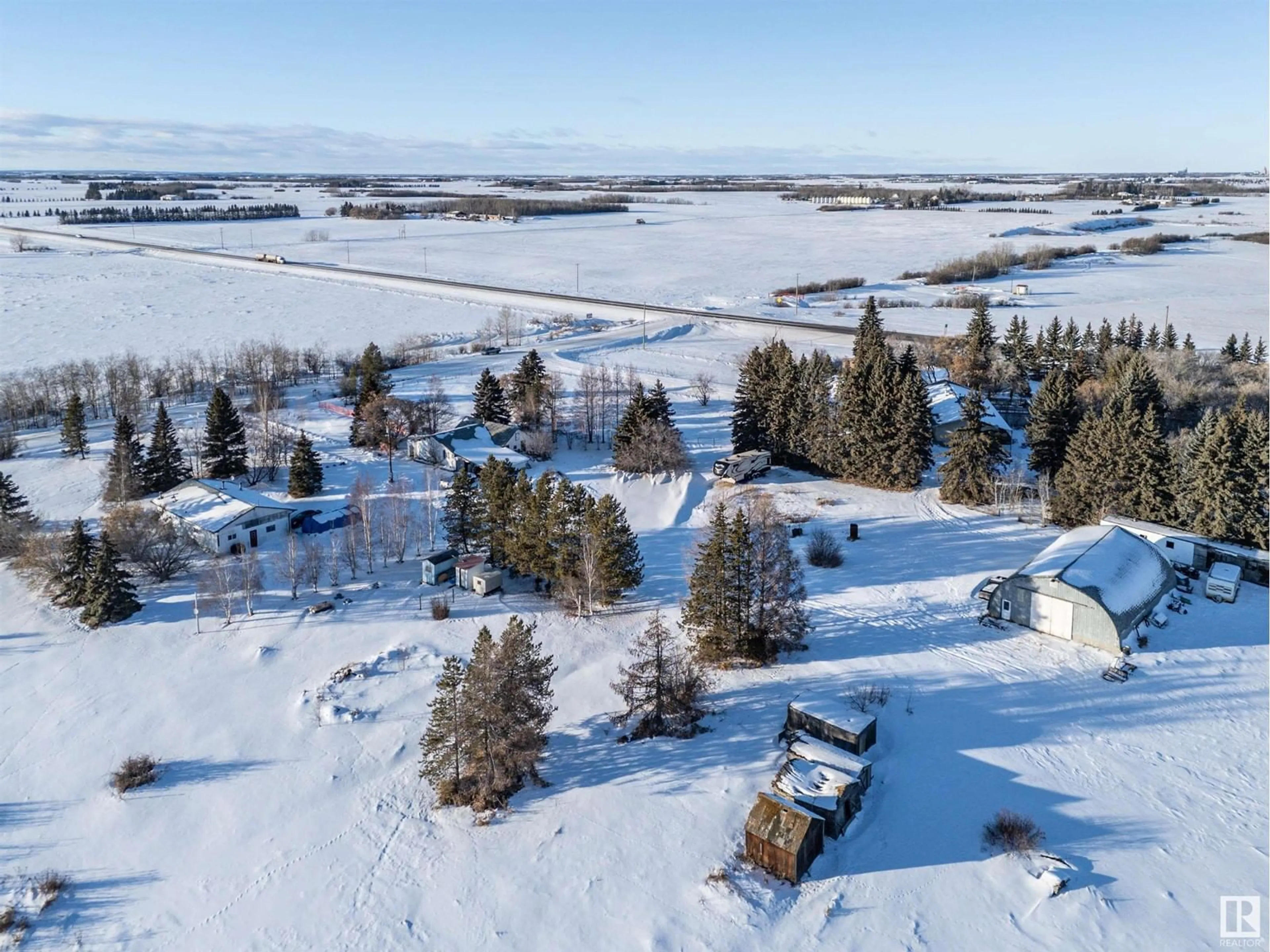 A pic from outside/outdoor area/front of a property/back of a property/a pic from drone, mountain view for 54529 RR 255, Rural Sturgeon County Alberta T8T0V2