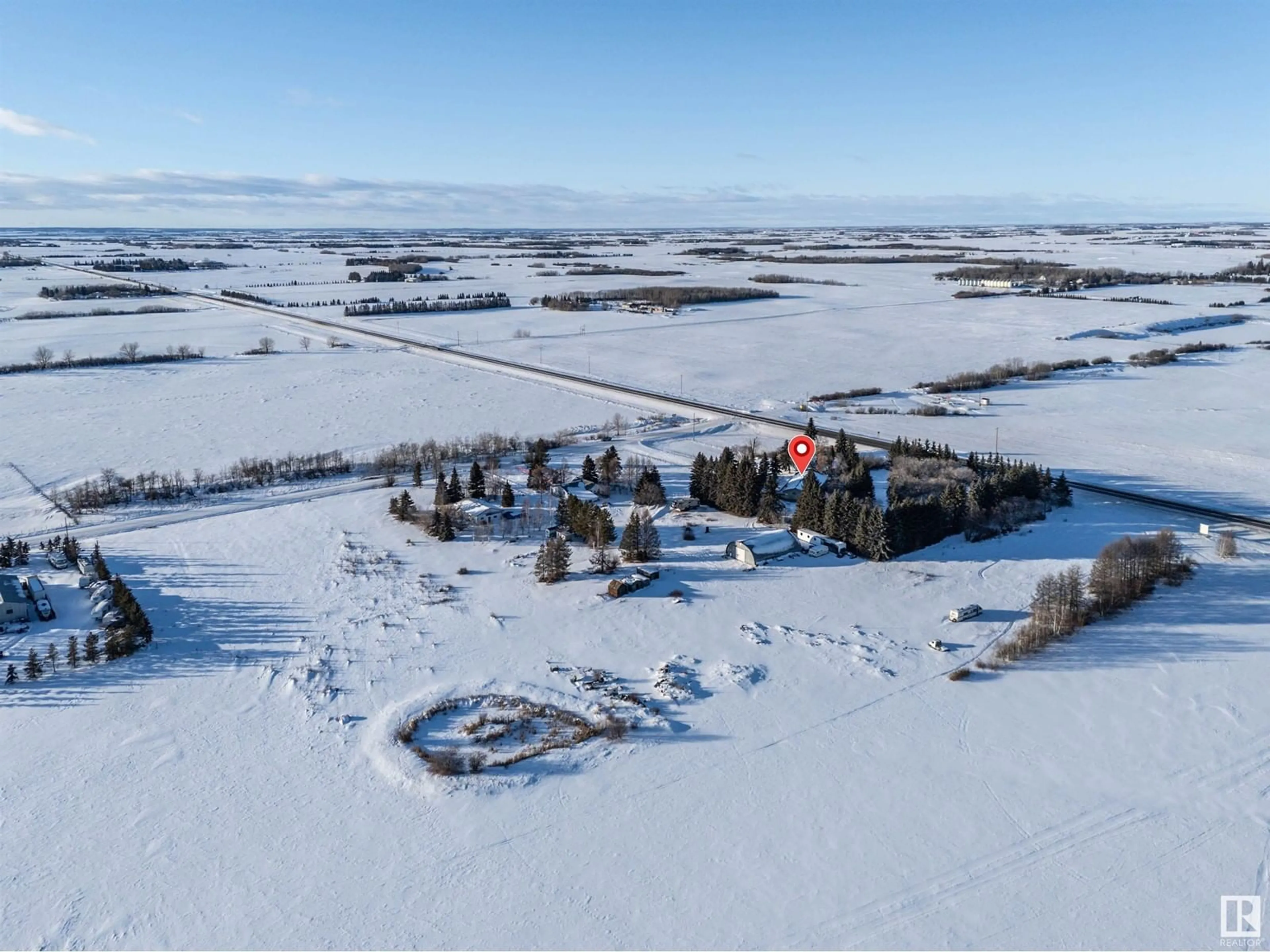 A pic from outside/outdoor area/front of a property/back of a property/a pic from drone, unknown for 54529 RR 255, Rural Sturgeon County Alberta T8T0V2