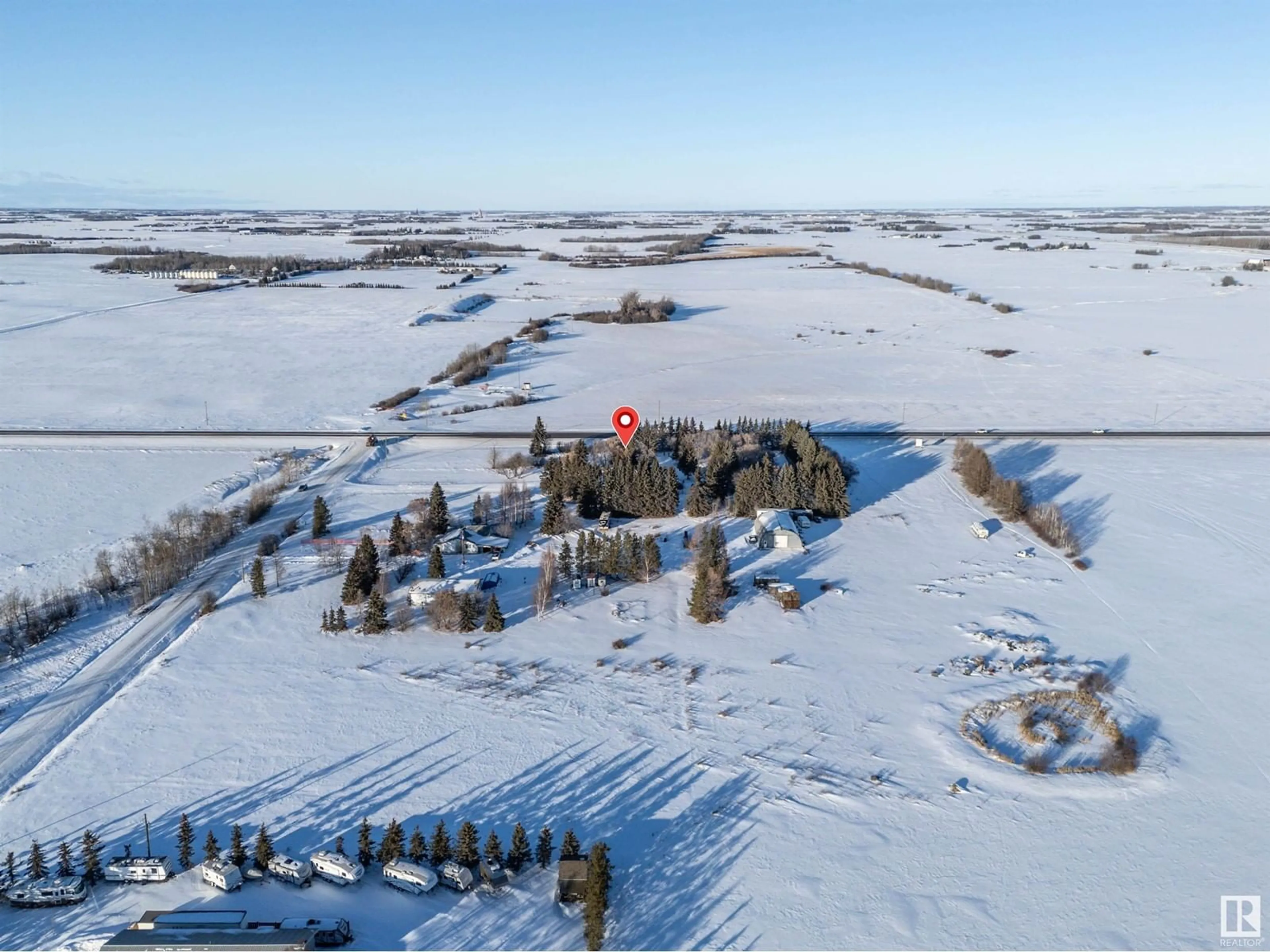 A pic from outside/outdoor area/front of a property/back of a property/a pic from drone, unknown for 54529 RR 255, Rural Sturgeon County Alberta T8T0V2