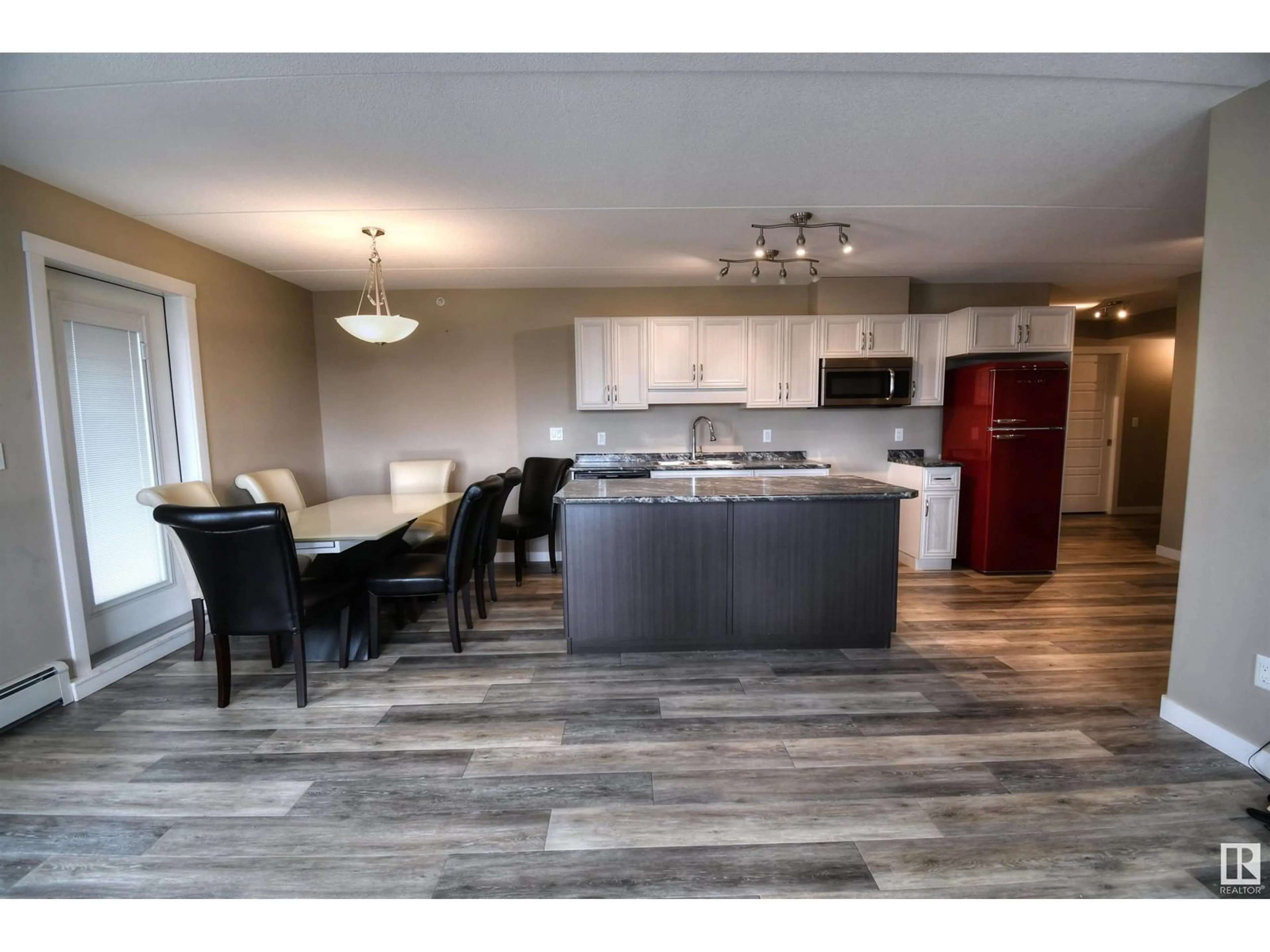 Open concept kitchen, wood/laminate floor for #303 4614B Lakeshore DR, St. Paul Town Alberta T0A3A3