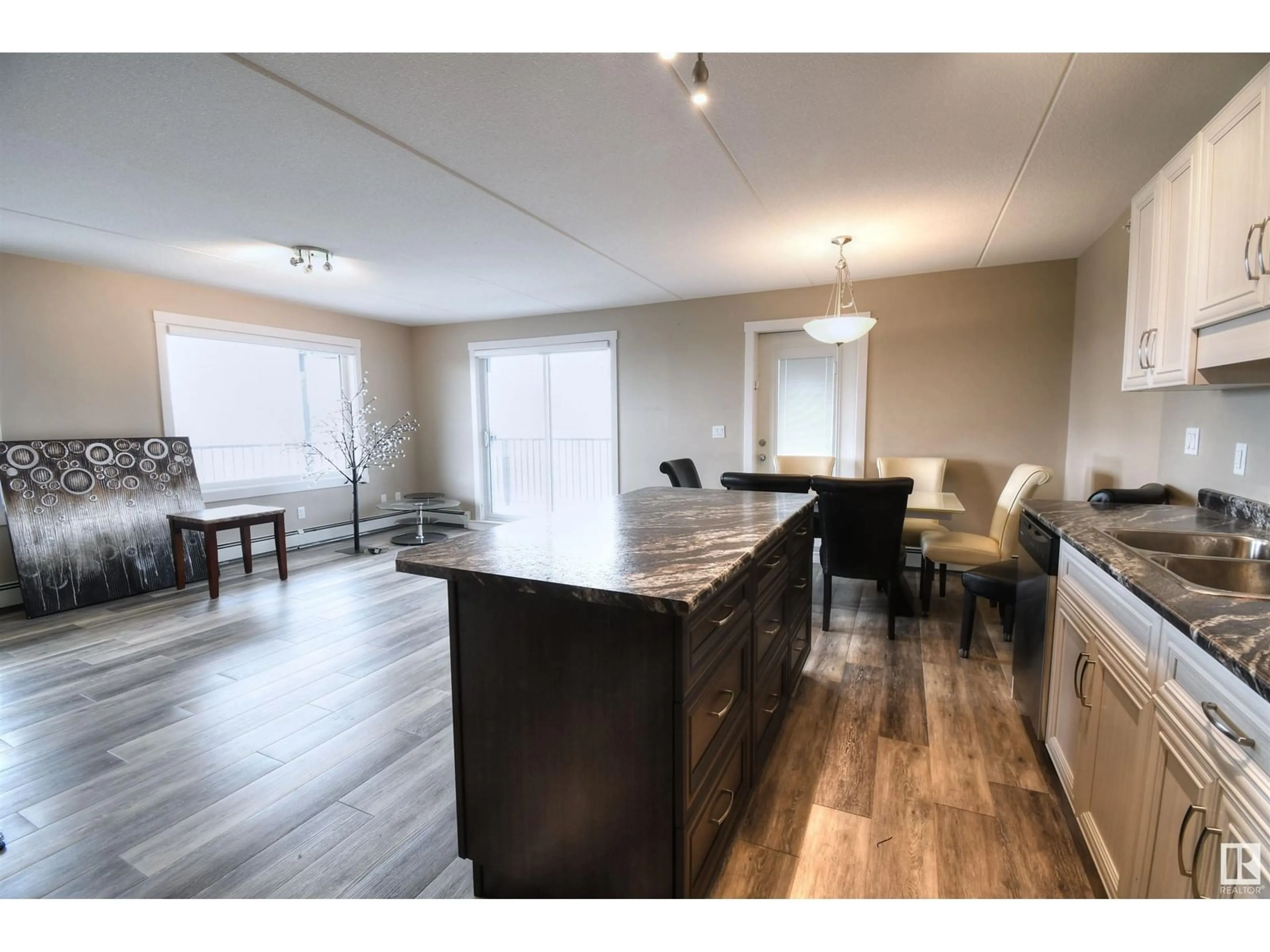 Open concept kitchen, wood/laminate floor for #303 4614B Lakeshore DR, St. Paul Town Alberta T0A3A3