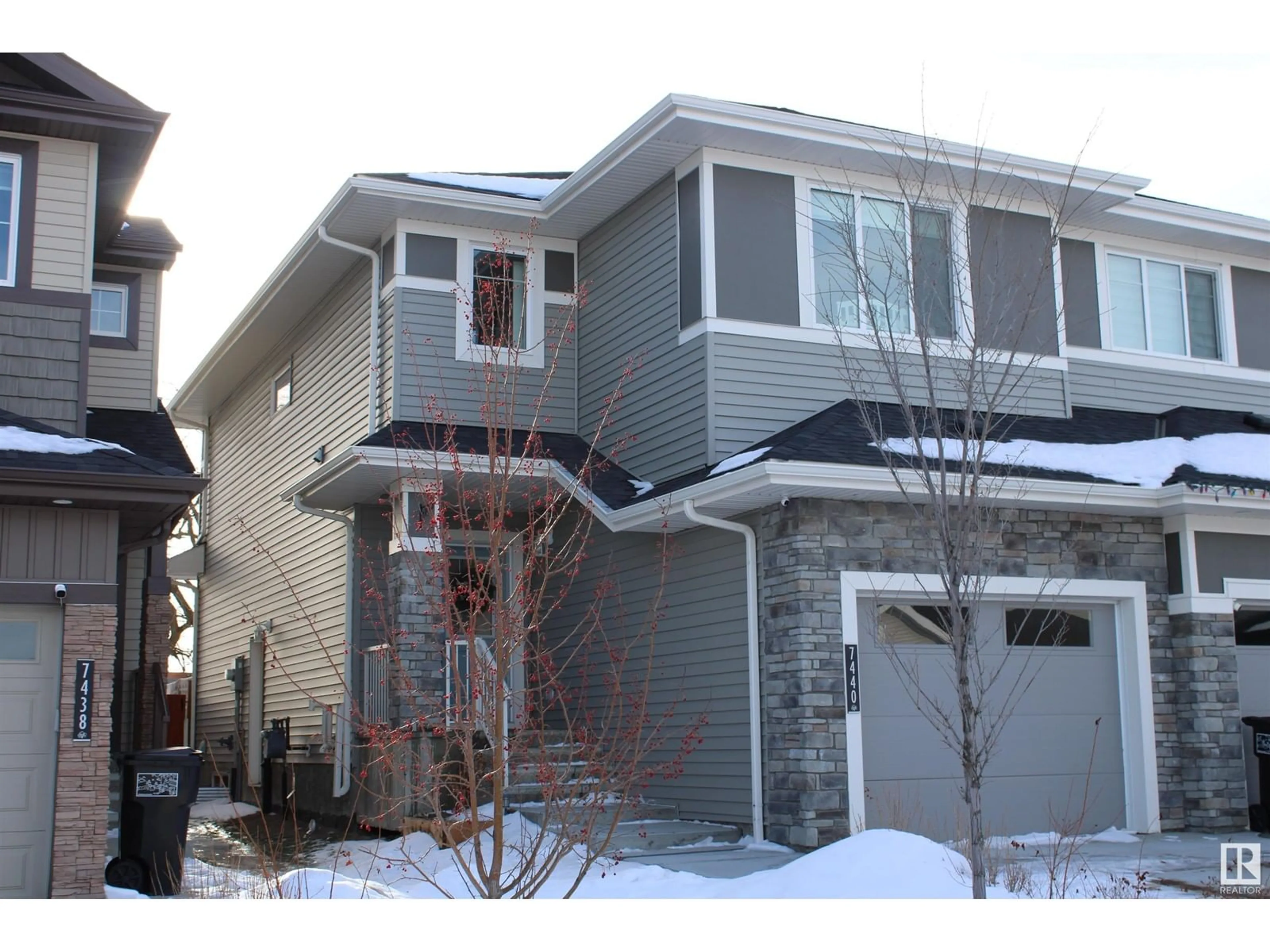 Home with vinyl exterior material, street for 7440 chivers CR SW, Edmonton Alberta T6W4M2