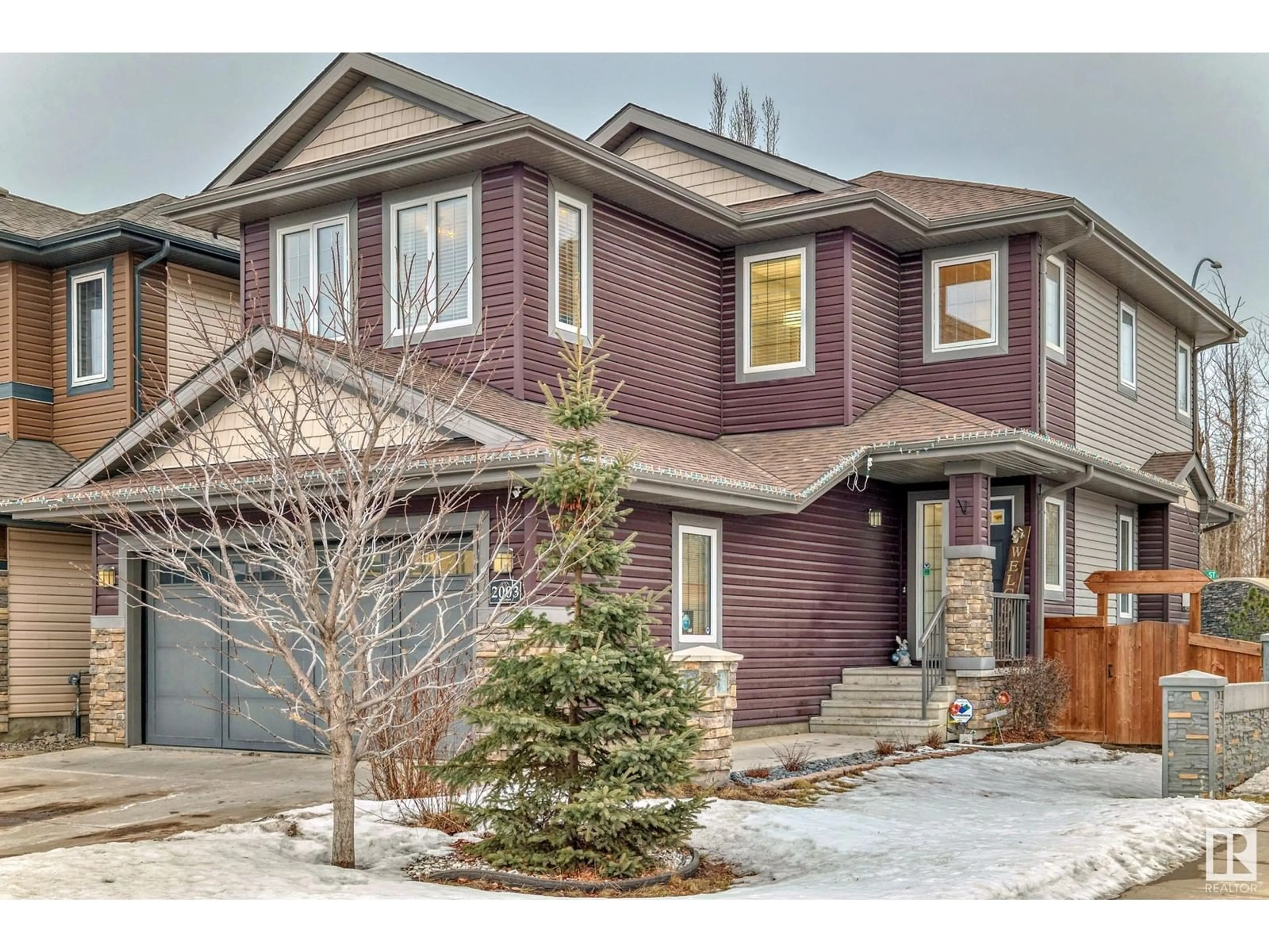 Home with brick exterior material, street for 2003 Redtail CM NW, Edmonton Alberta T5S0H2