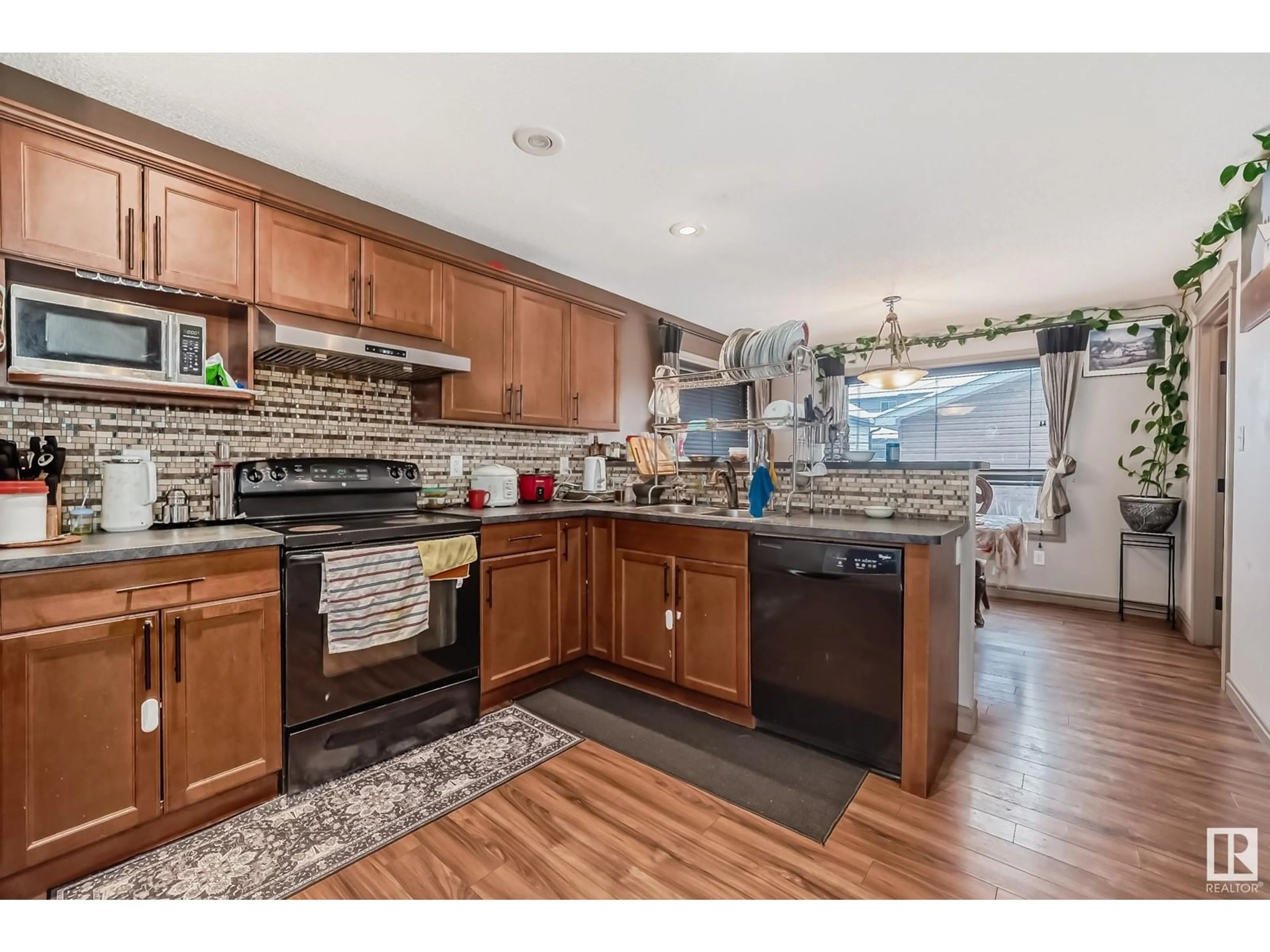 Open concept kitchen, unknown for 3125 17A AV NW, Edmonton Alberta T6T0P5