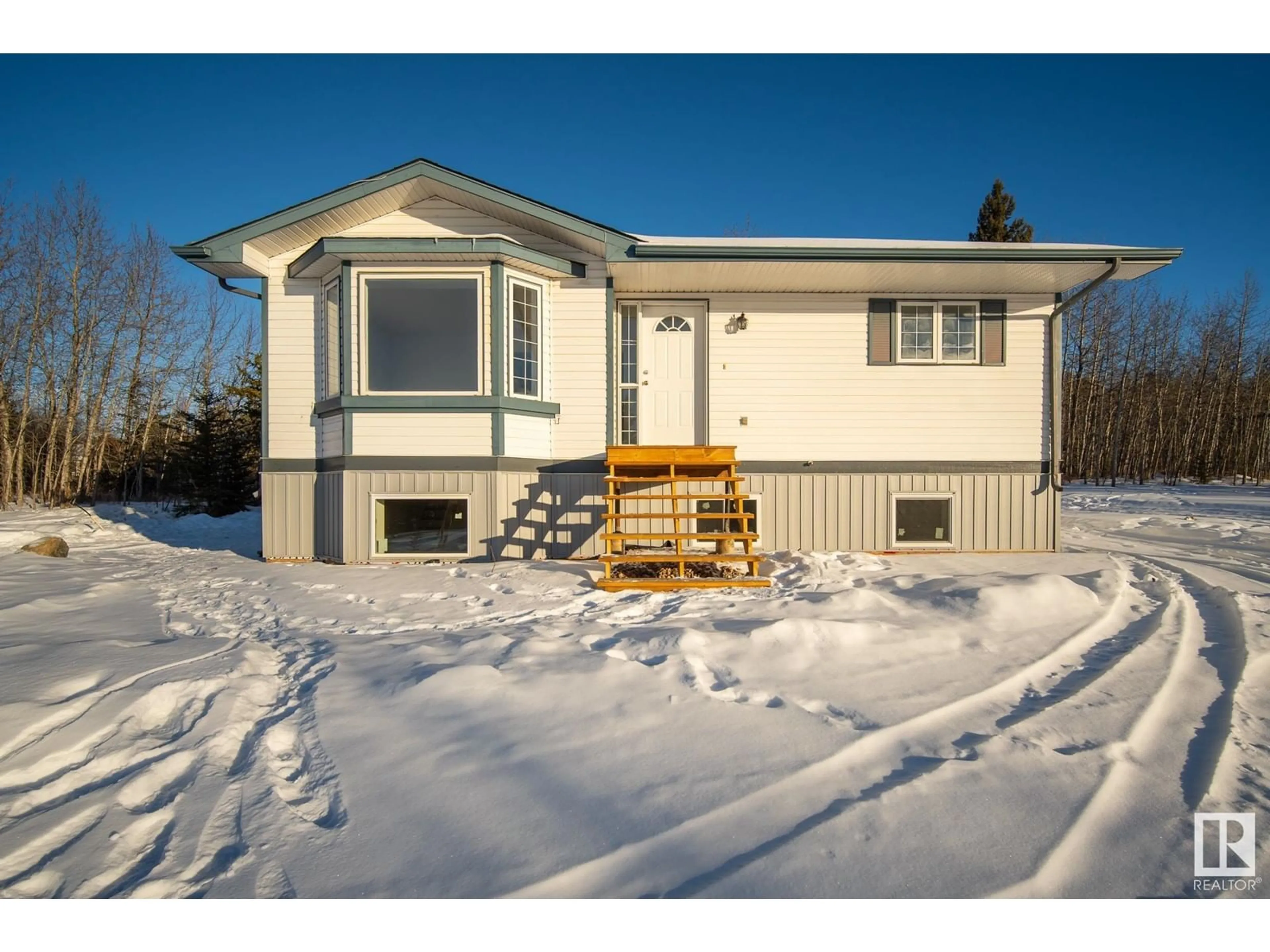 Home with vinyl exterior material, street for 17- 59027 Range Road 232, Rural Thorhild County Alberta T0A2W0