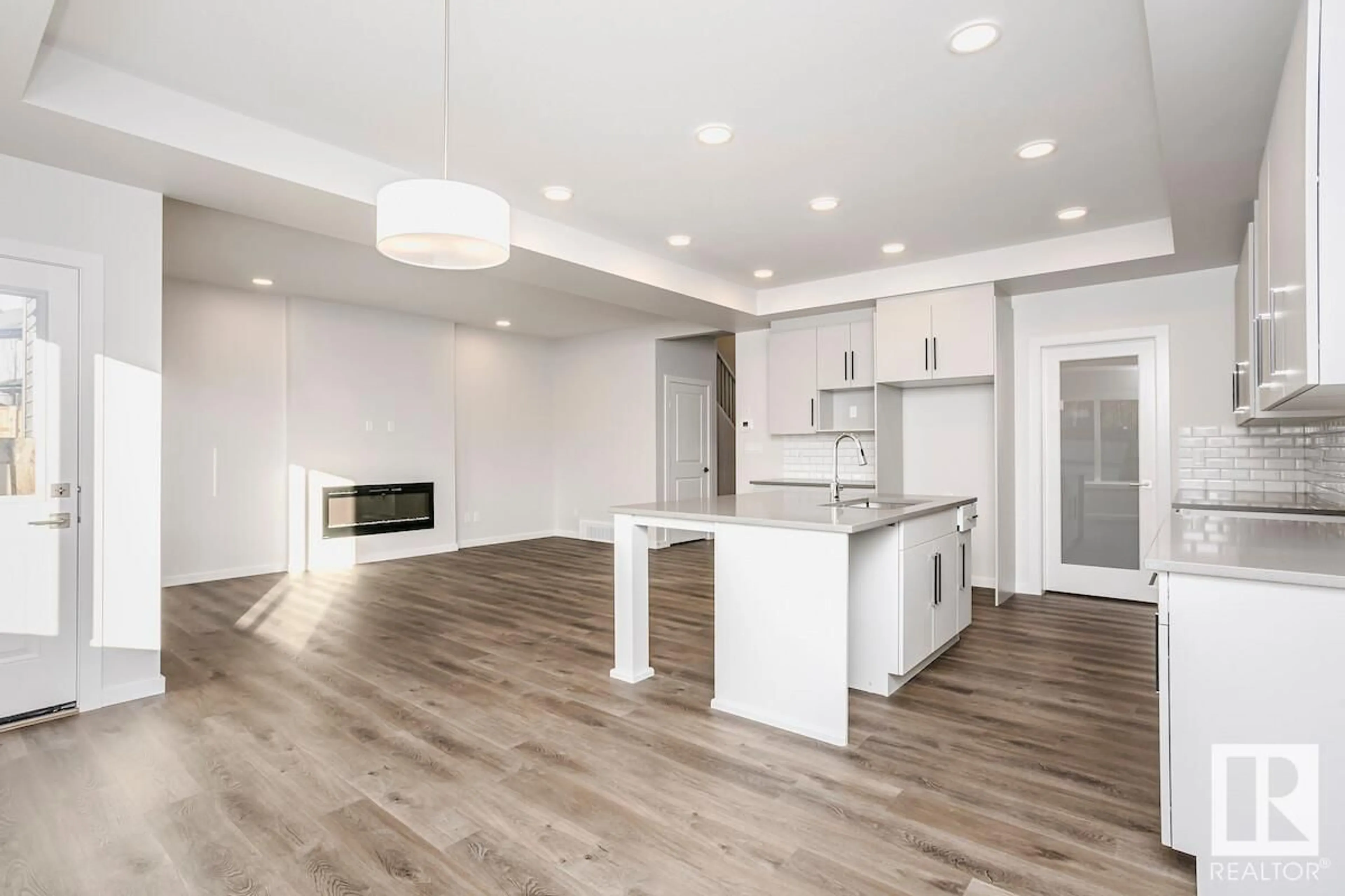 Open concept kitchen, wood/laminate floor for 19 ASHBURY CR, Spruce Grove Alberta T7X3C6