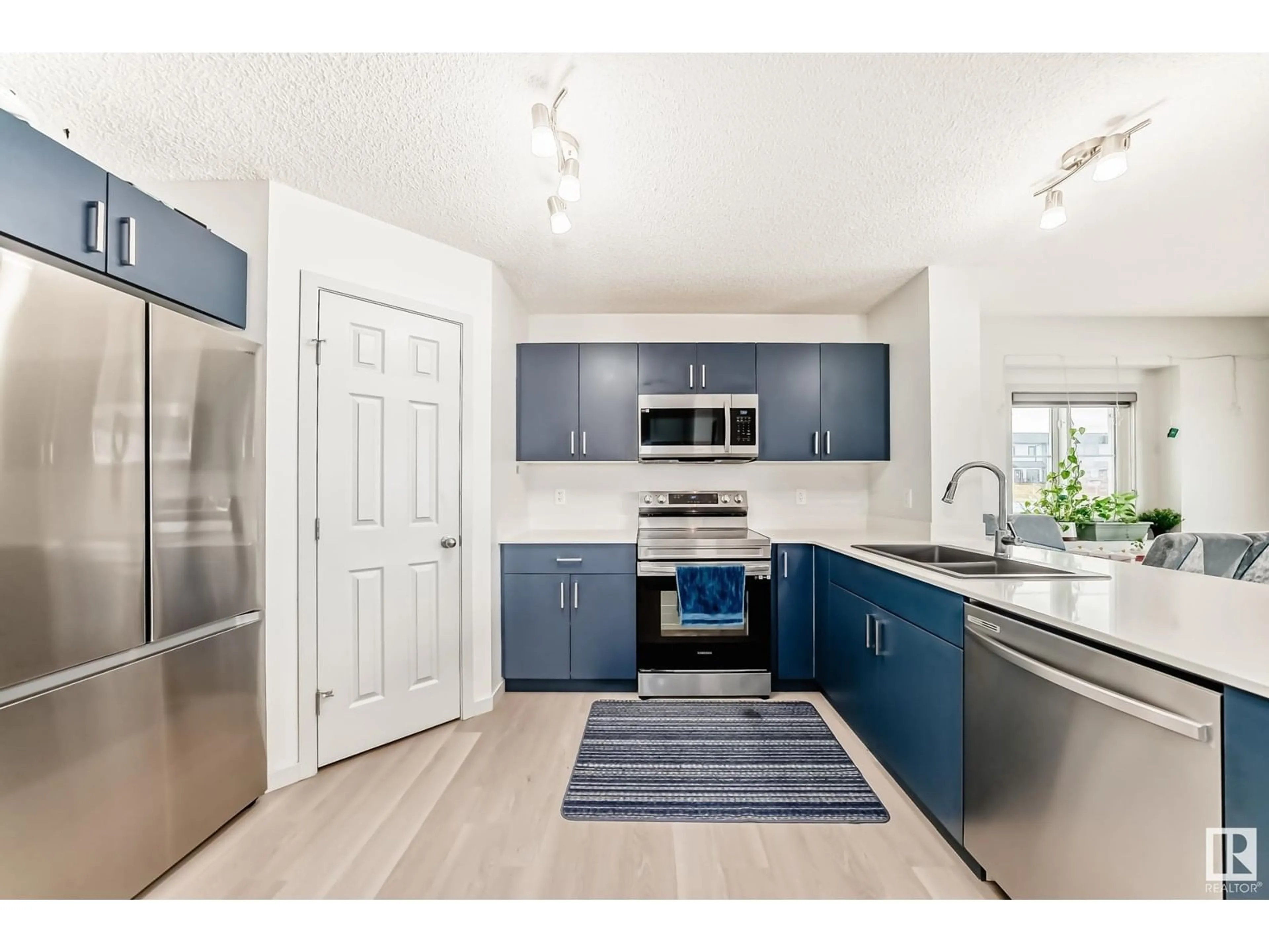 Open concept kitchen, unknown for 9804 227 ST NW, Edmonton Alberta T5T7T9