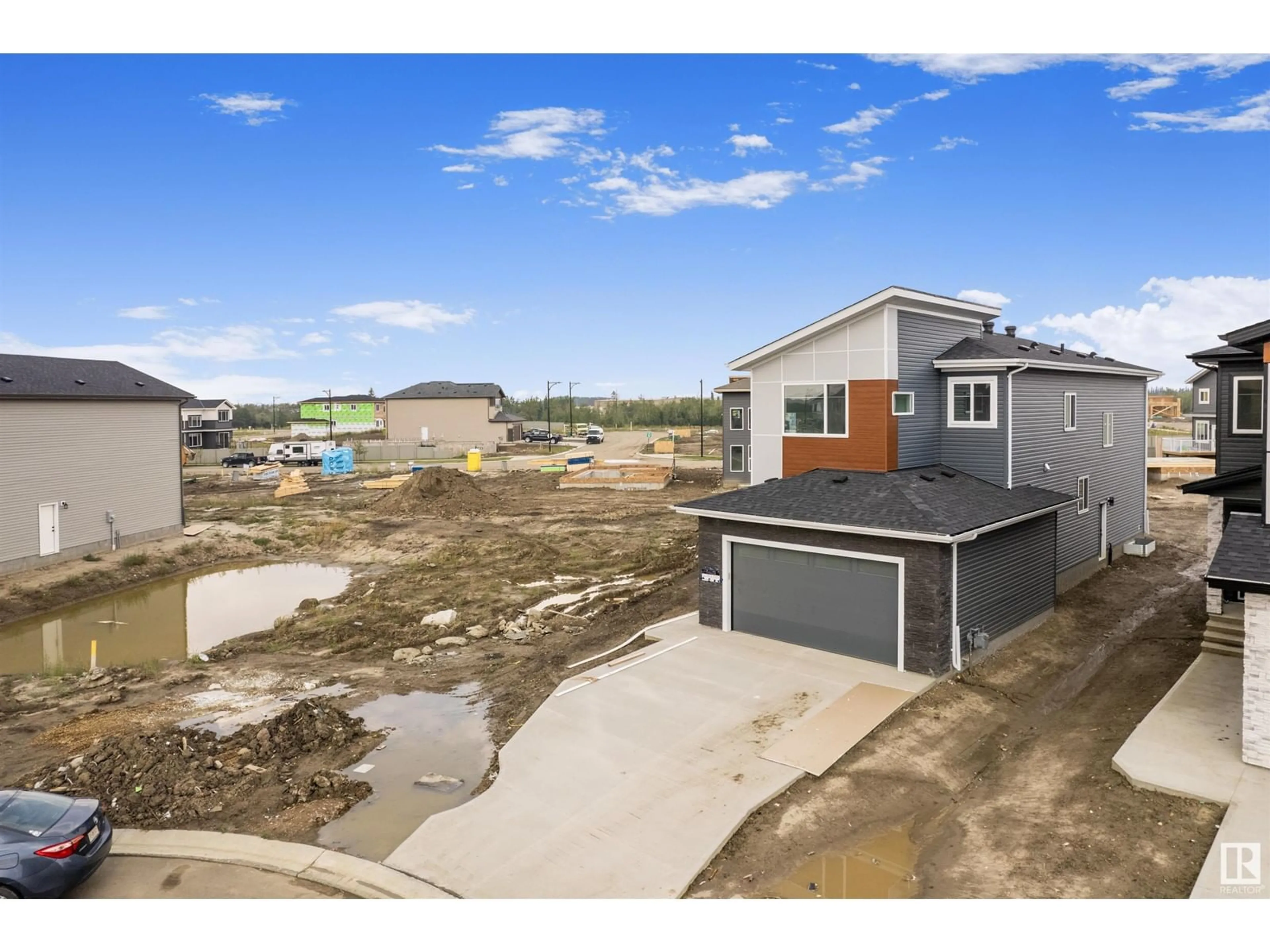 A pic from outside/outdoor area/front of a property/back of a property/a pic from drone, street for 1812 62 AV NE, Rural Leduc County Alberta T4X3C8