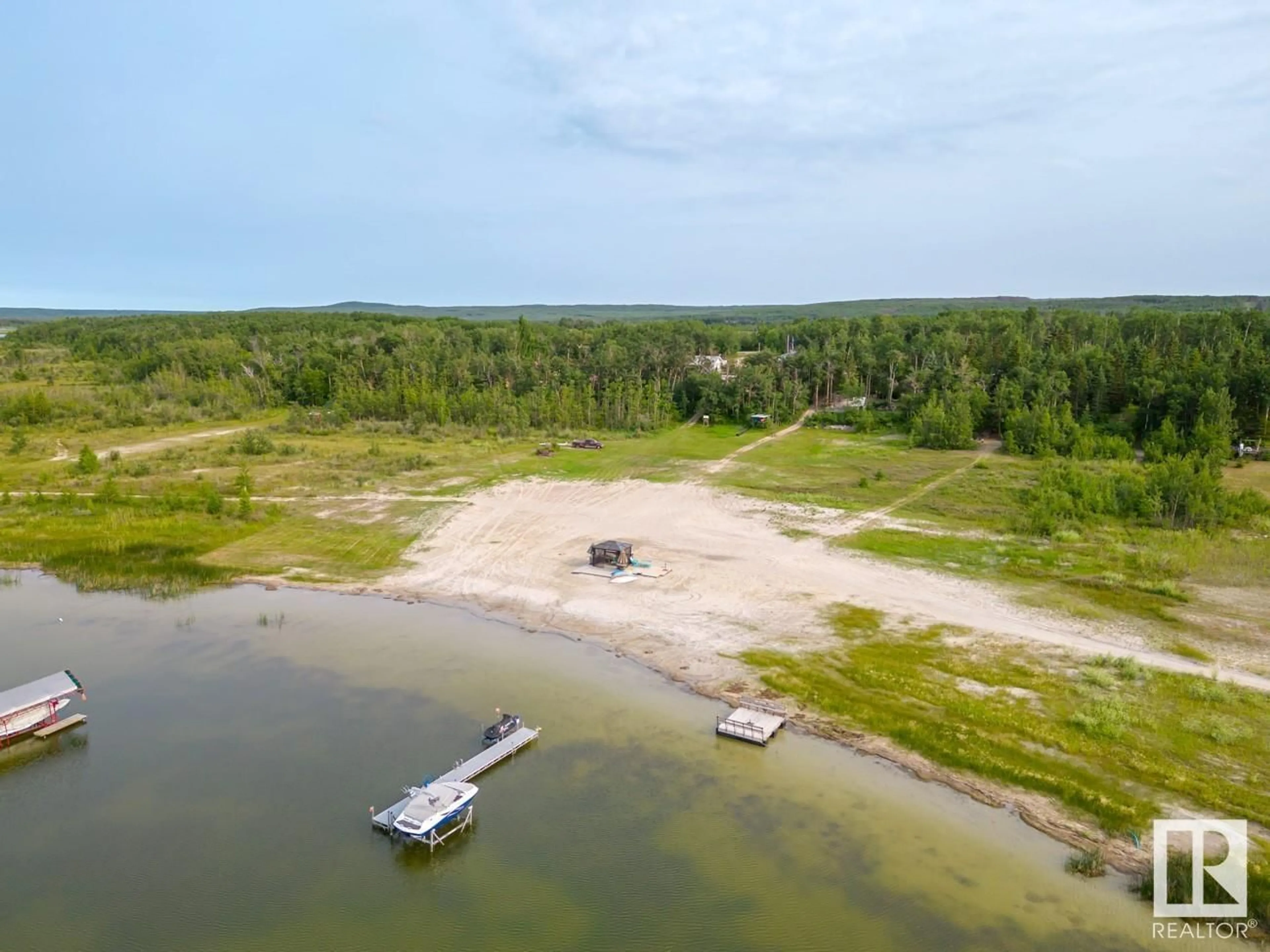 A pic from outside/outdoor area/front of a property/back of a property/a pic from drone, water/lake/river/ocean view for 59317 Rge Rd 454 HN 10, Rural Bonnyville M.D. Alberta T9N2J2