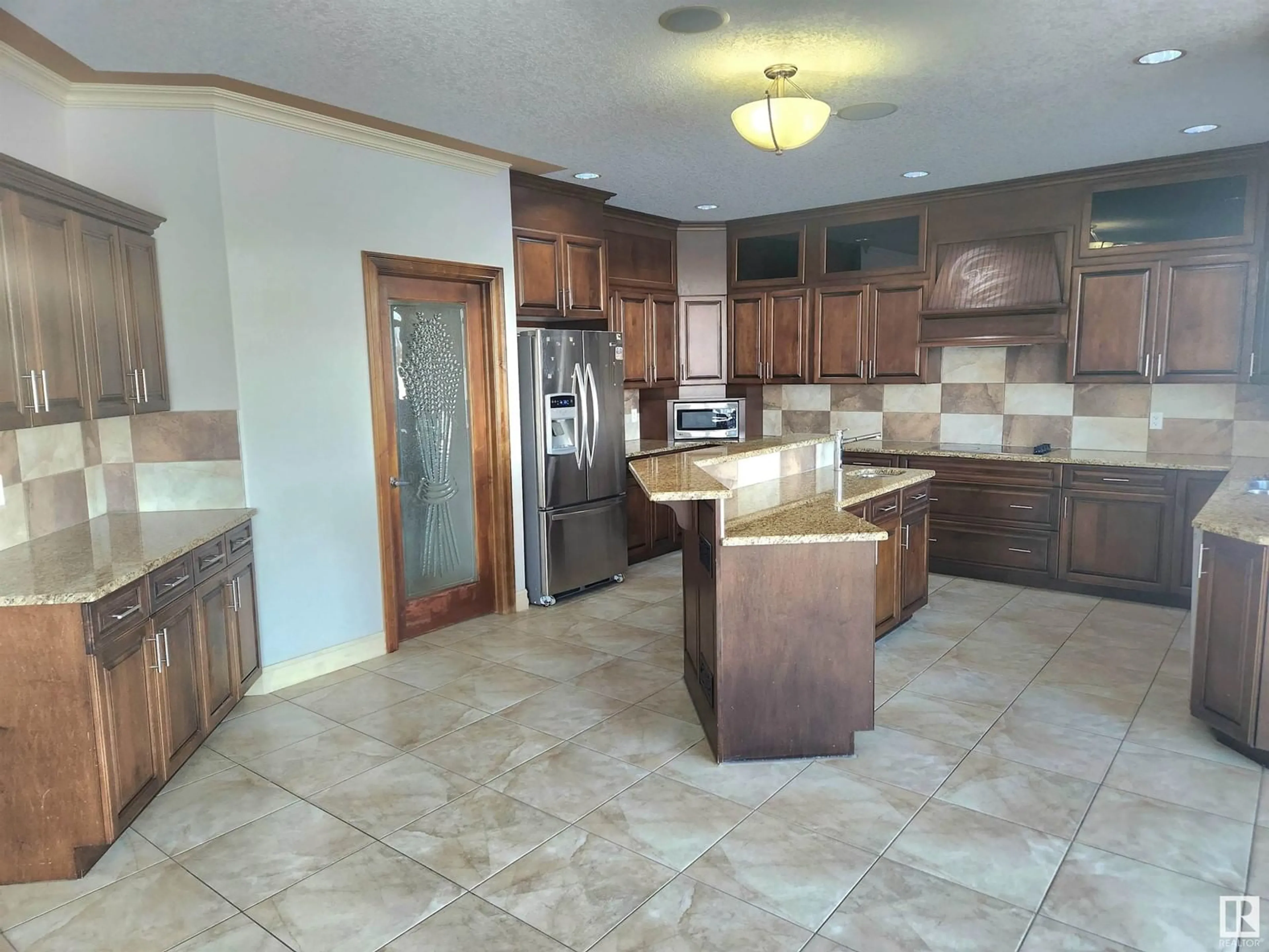 Open concept kitchen, ceramic/tile floor for #305 26023 TWP ROAD 544, Rural Sturgeon County Alberta T8T0B6