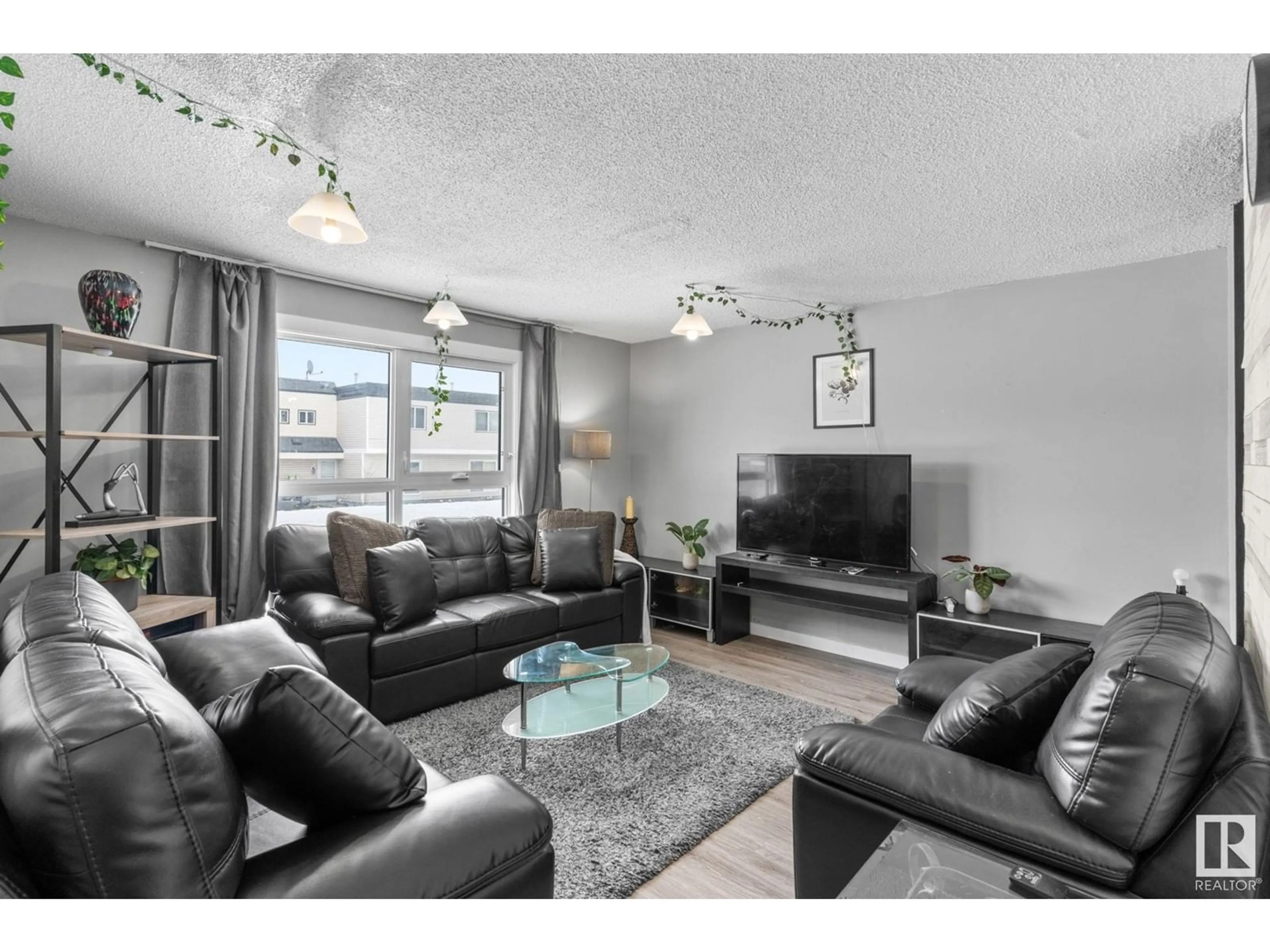 Living room with furniture, unknown for #187 11421 34 ST NW NW, Edmonton Alberta T5W5J7