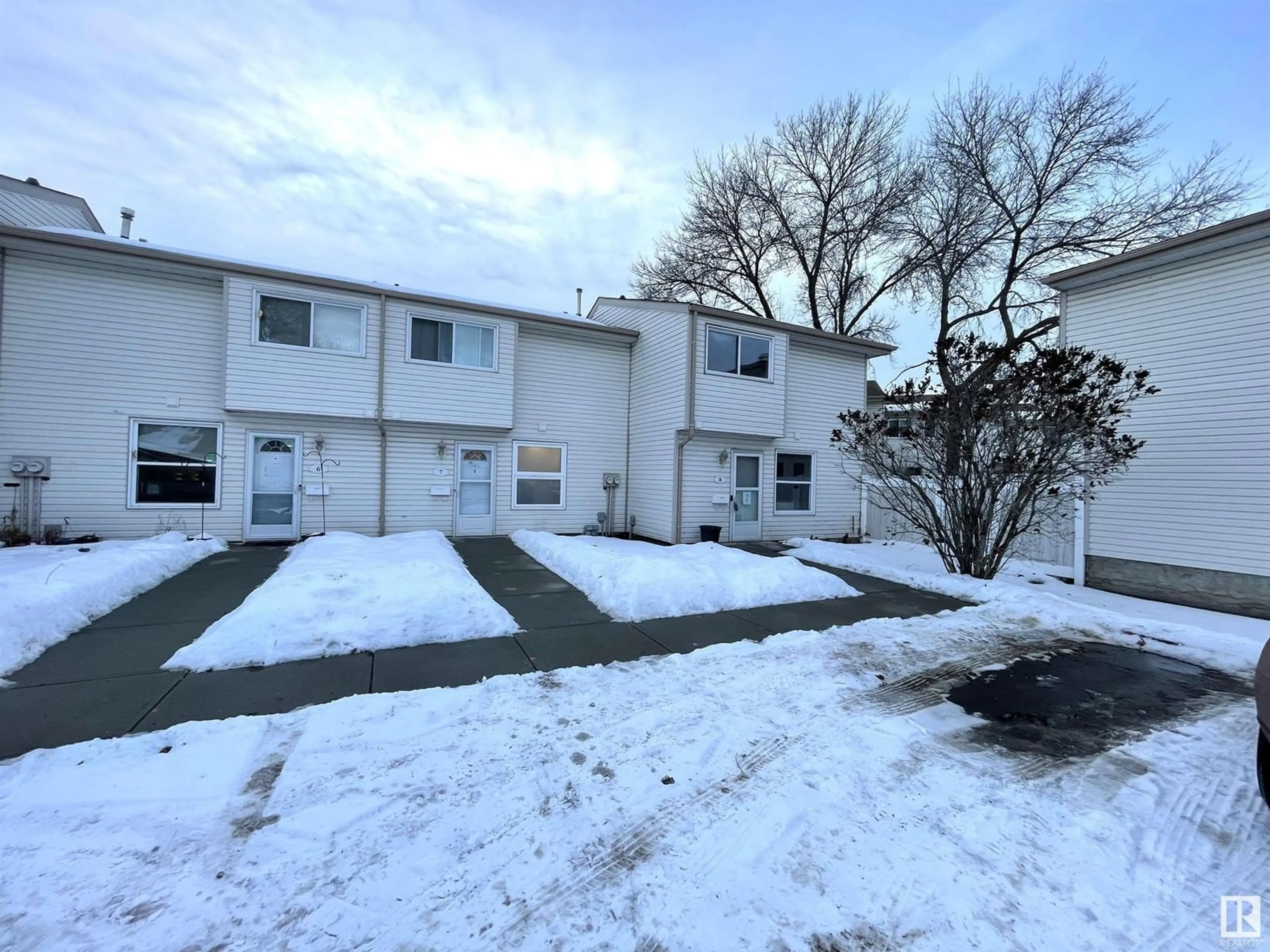 A pic from outside/outdoor area/front of a property/back of a property/a pic from drone, street for #8 2024 57 ST NW, Edmonton Alberta T6L2Z3