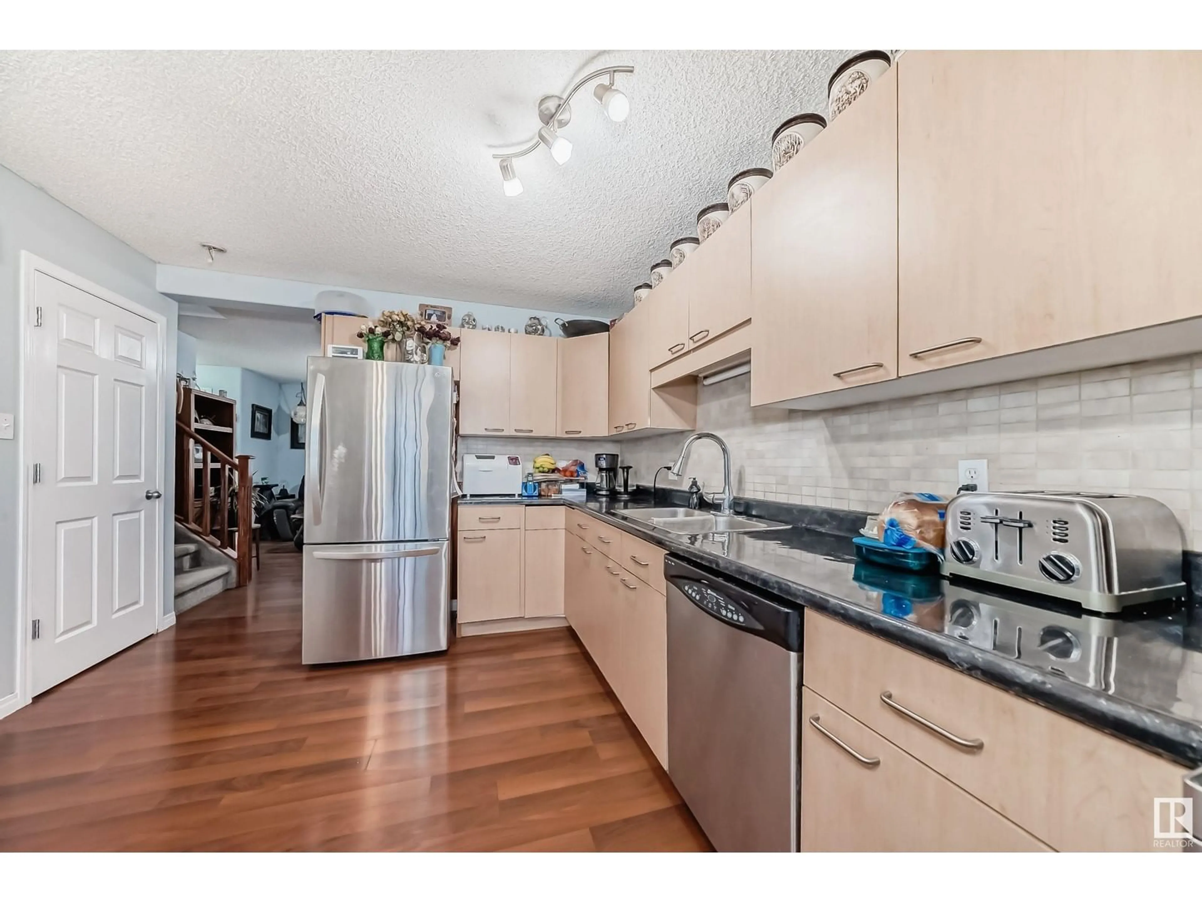 Open concept kitchen, unknown for 2536 30 Ave NW, Edmonton Alberta T6T2A1